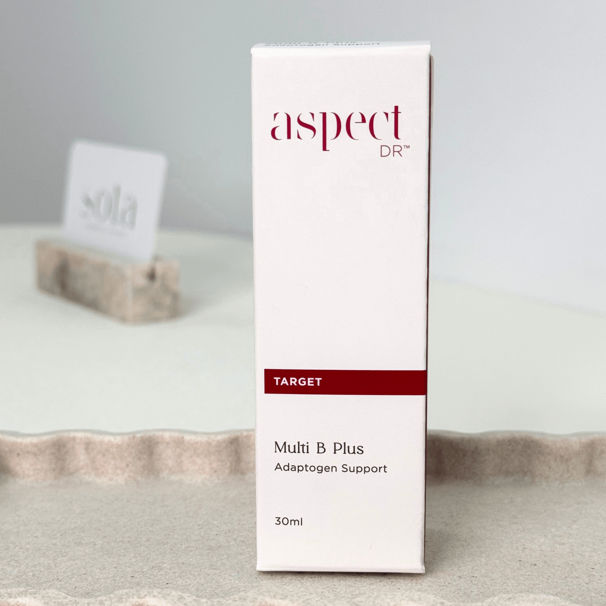 Aspect Dr Multi B Plus 30ml front of packaging on blurred neutral background