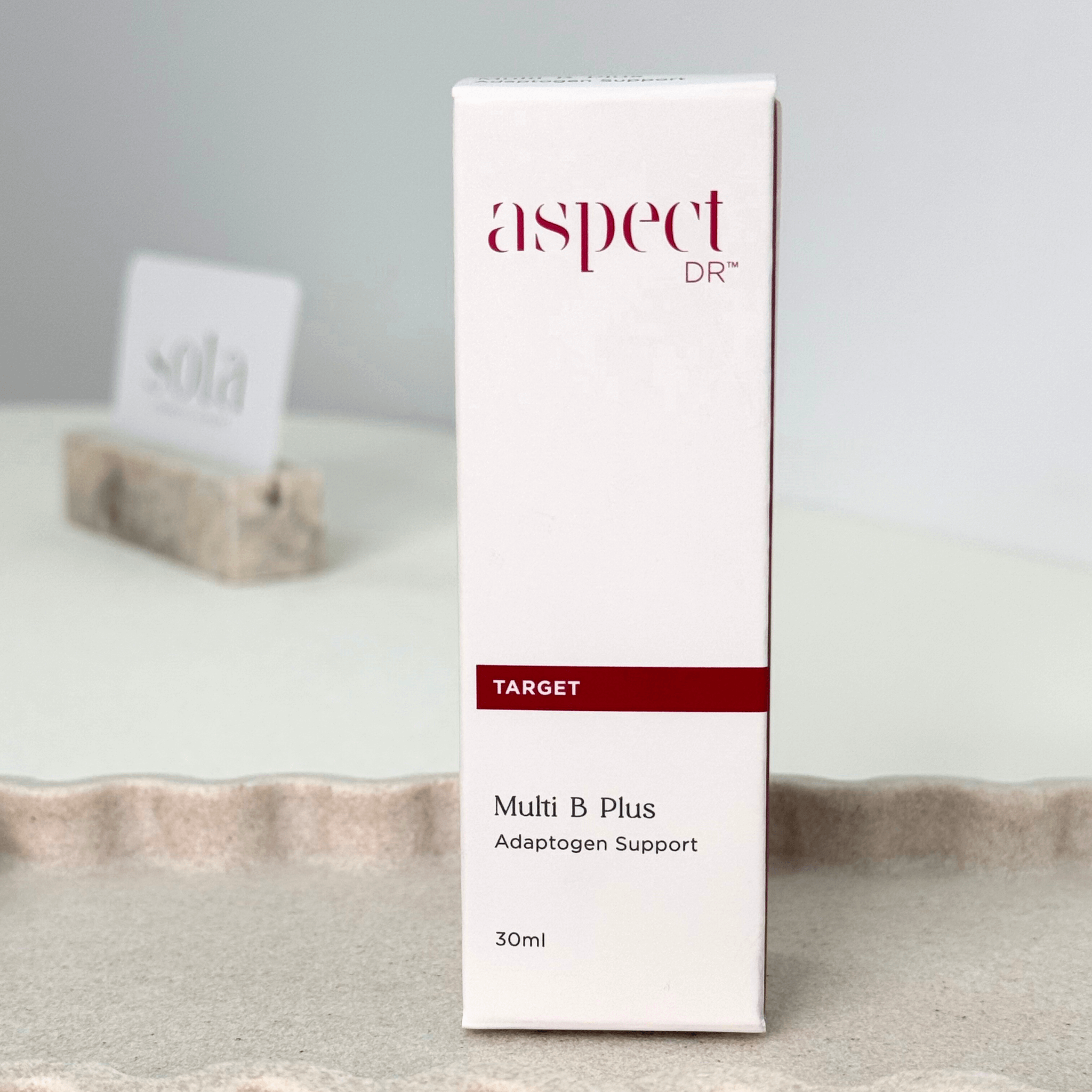 Aspect Dr Multi B Plus 30ml front of packaging on blurred neutral background
