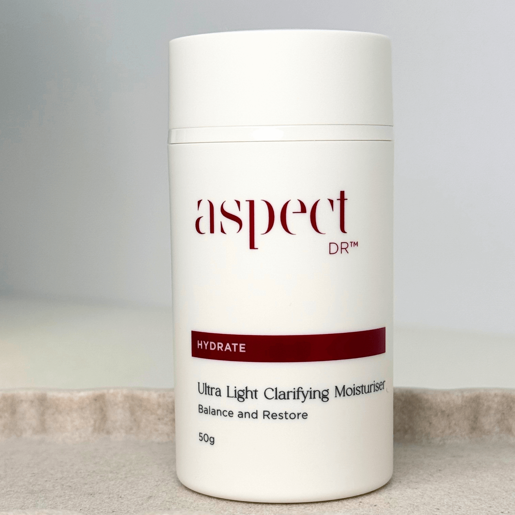 Aspect Dr Ultra Light Moisturiser container on neutral background