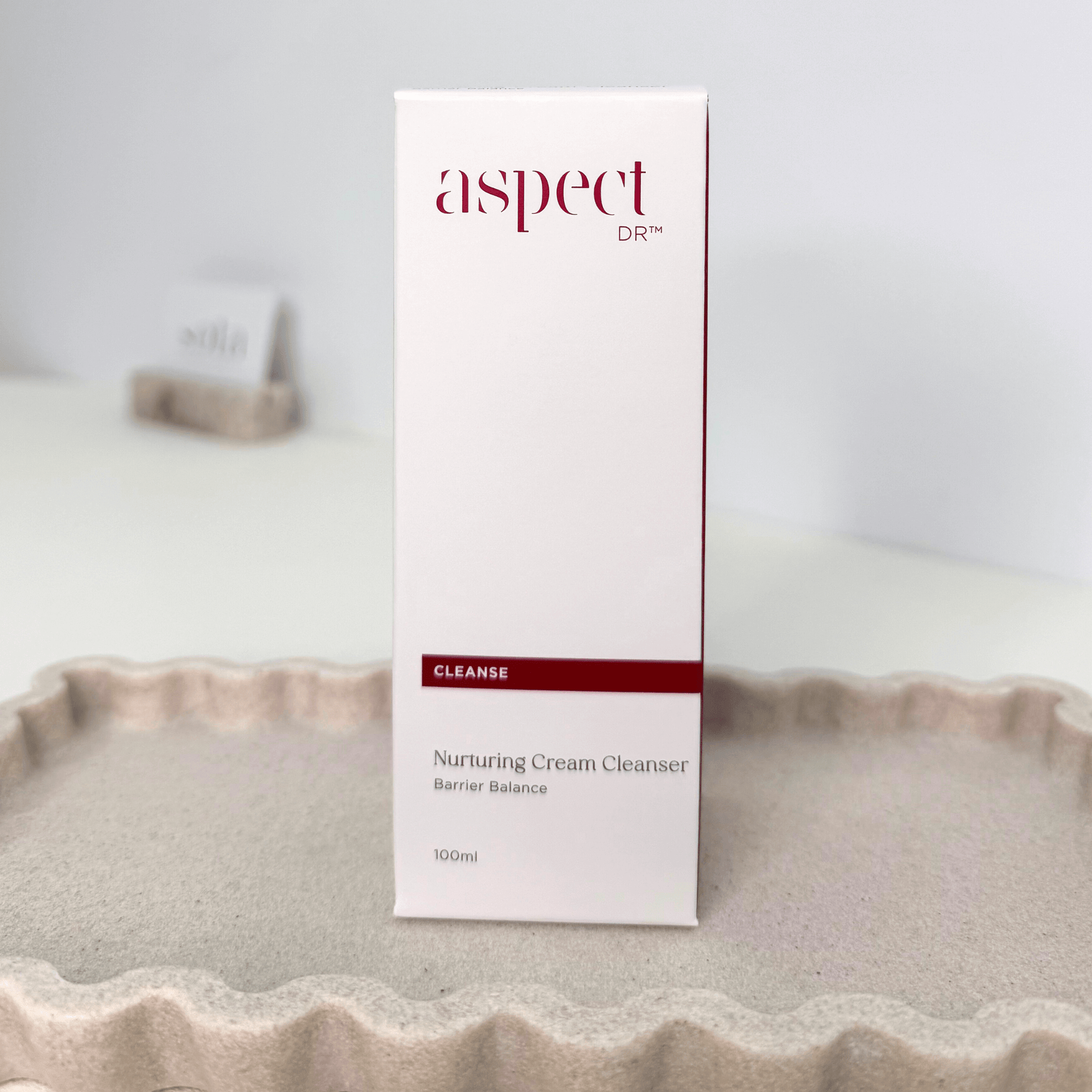 Aspect Nurturing Cream cleanser 100ml on beige background
