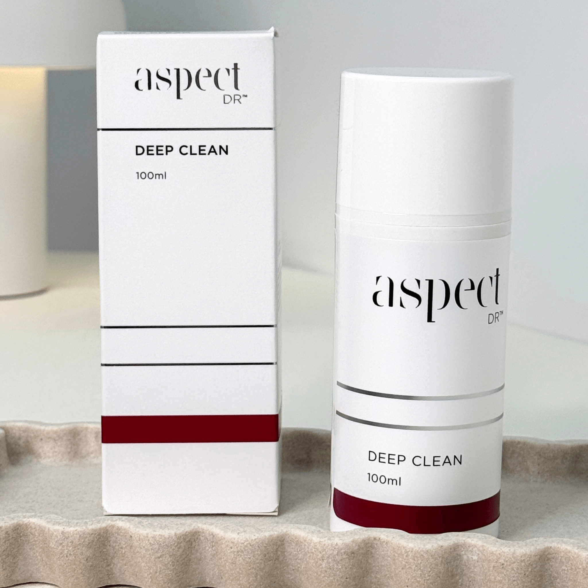 Deep Clean Aspect Dr container and packaging on white background