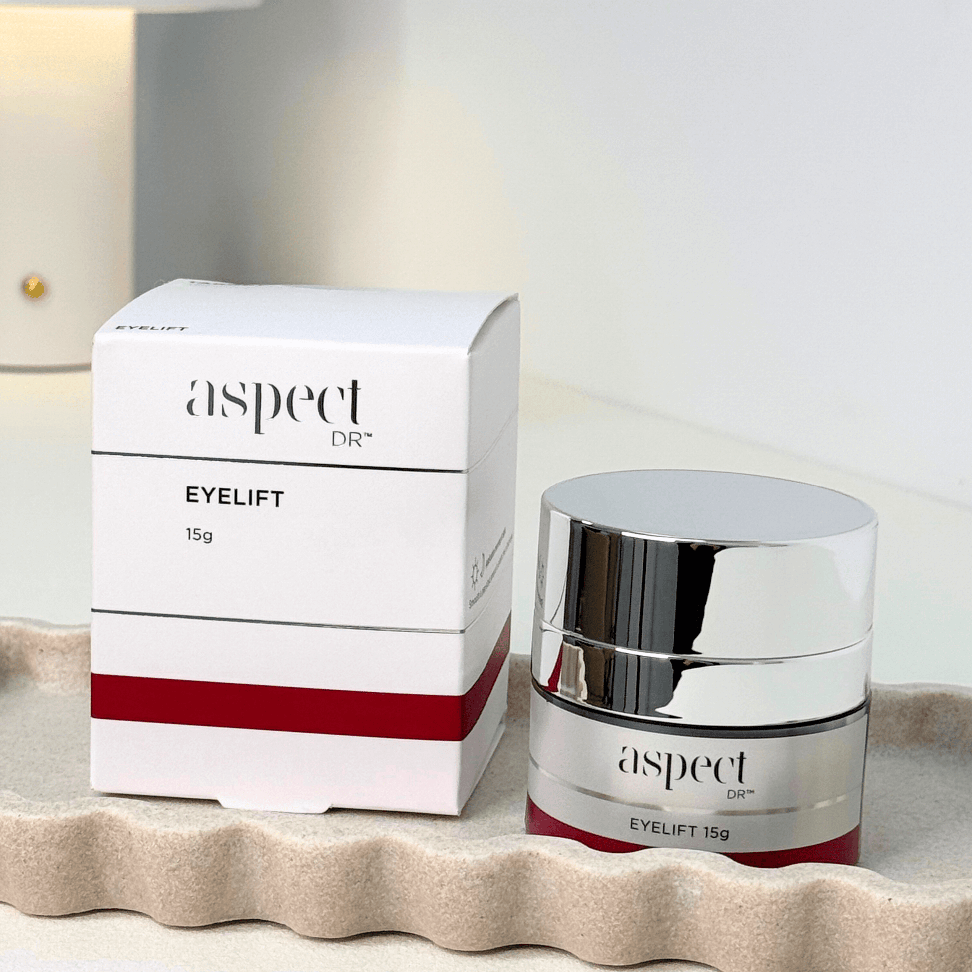 Eyelift 15g jar and box packaging on a neutral background