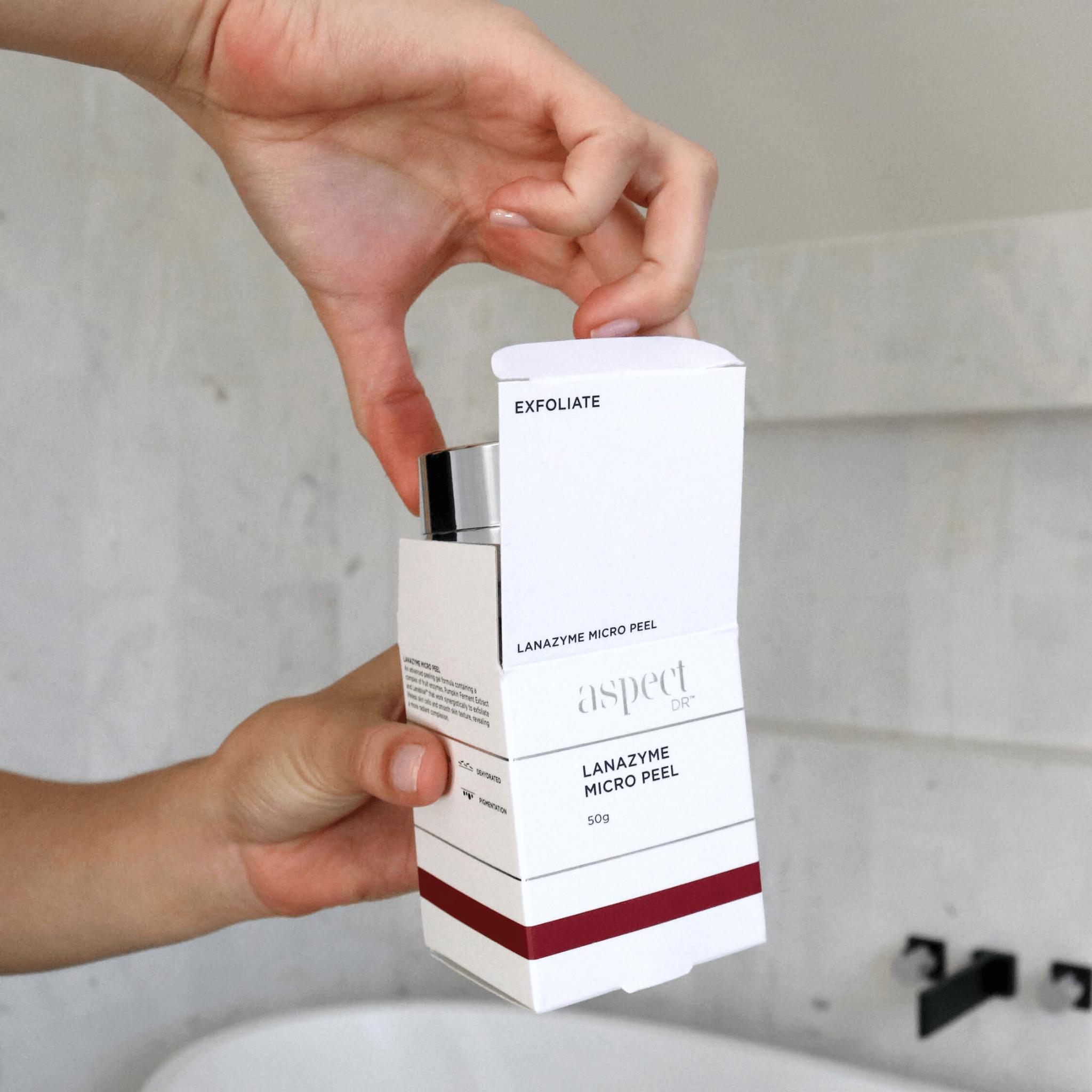 Lanazyme Micropeel Aspect Dr being opened in bathroom