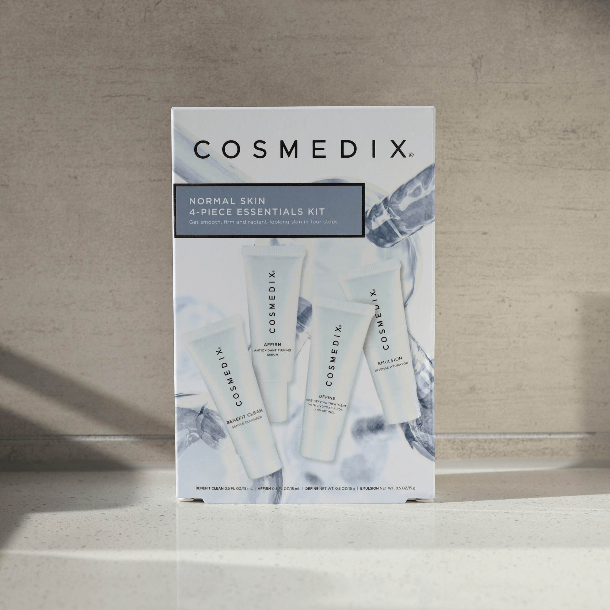 Cosmedix normal skin 4-piece essentials kit packaging on a neutral background