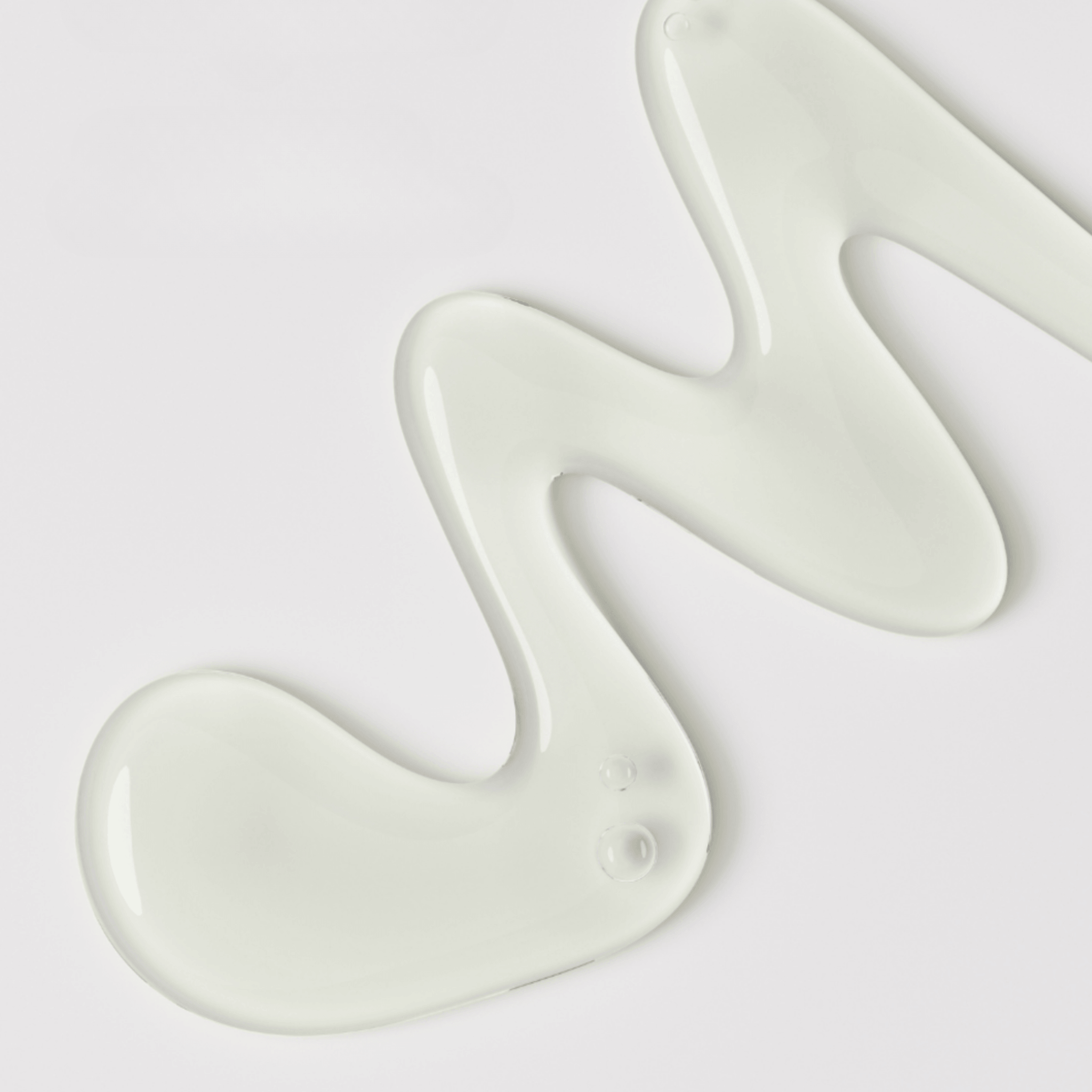 Swatch of Aspect Nourishing cleanser oil on a light grey background