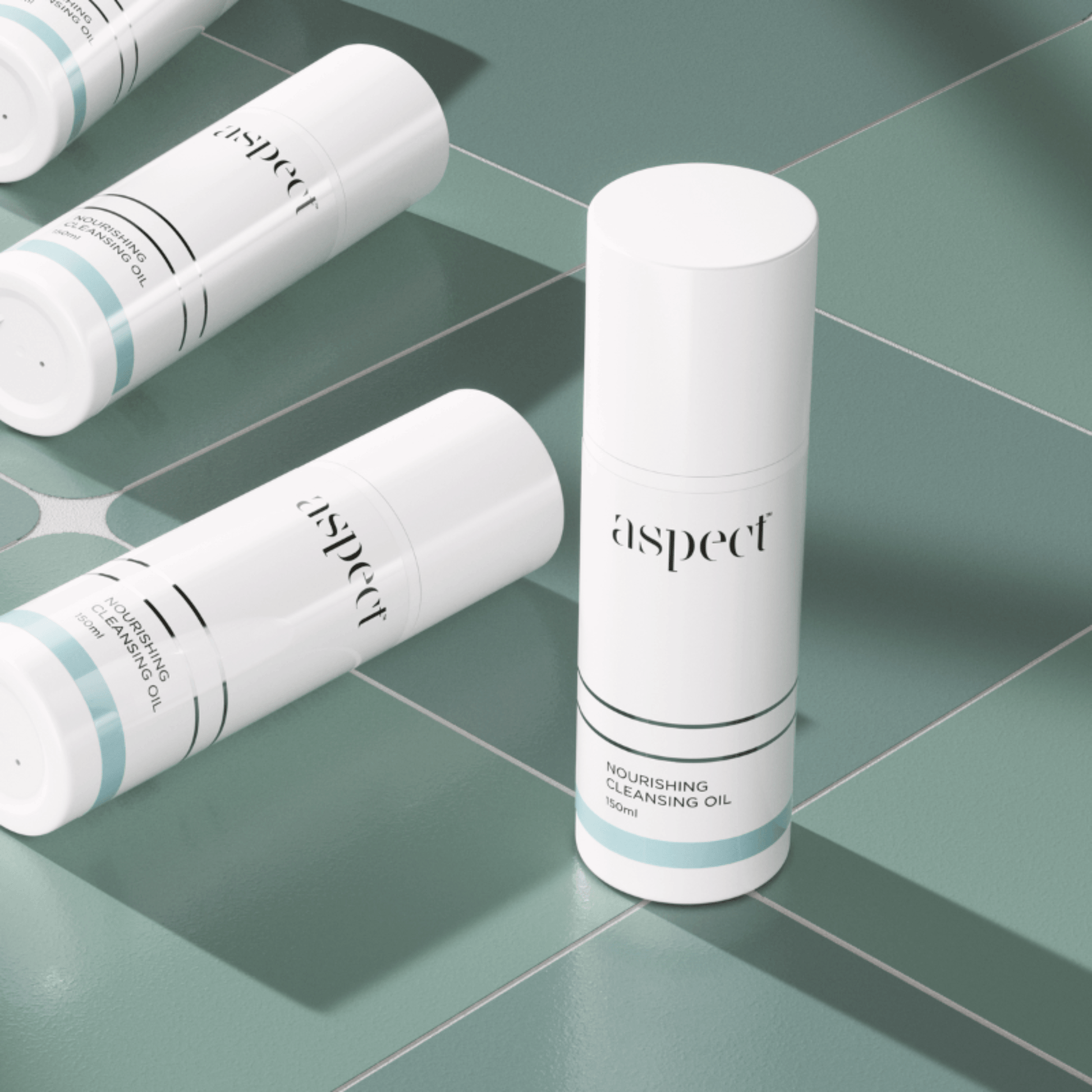 Aspect Nourishing Cleansing Oil containers on light blue tiled background