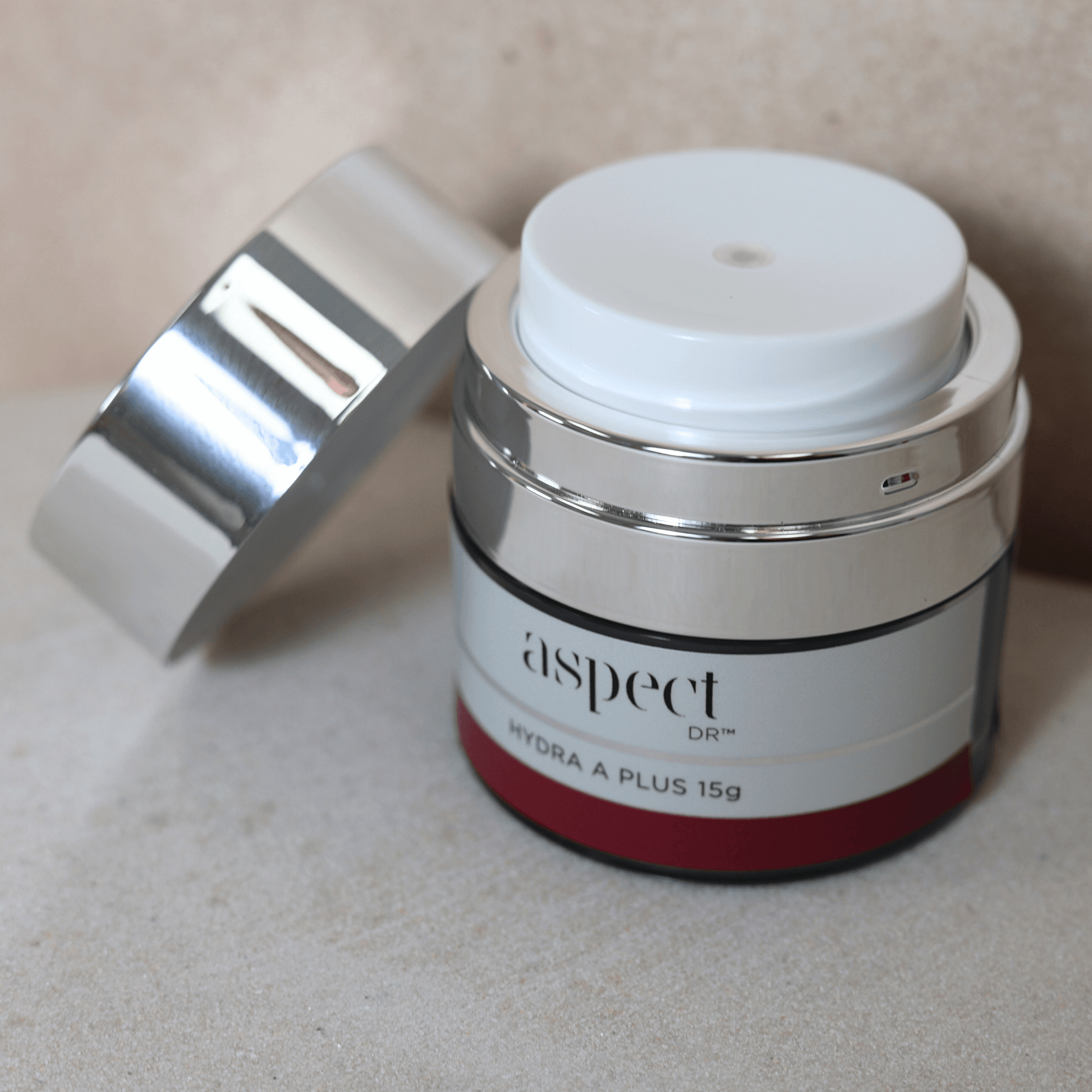 Aspect Dr Hydra A Plus Retinol jar with on neutral background