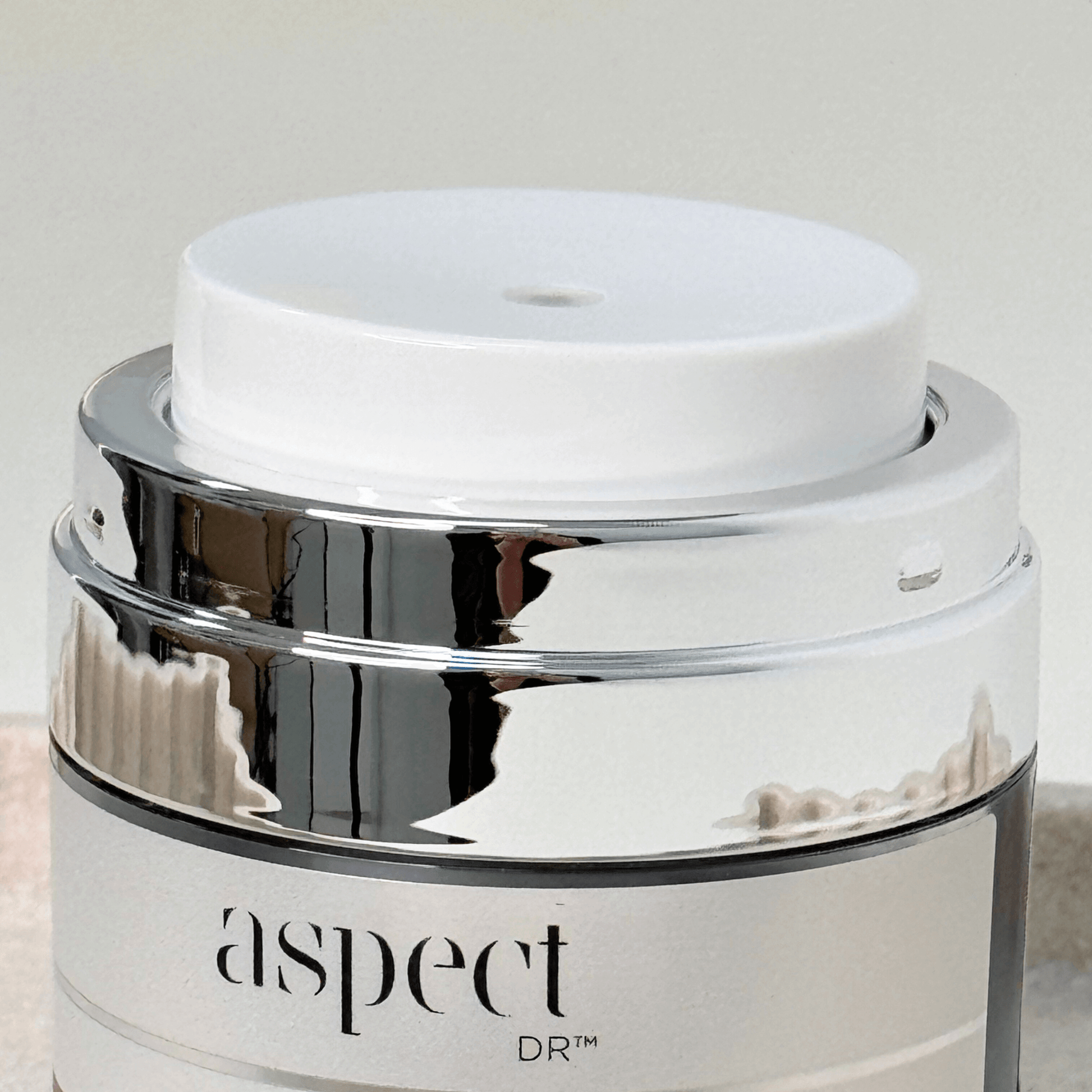 Aspect Dr Hydra A close up of pump top on white background