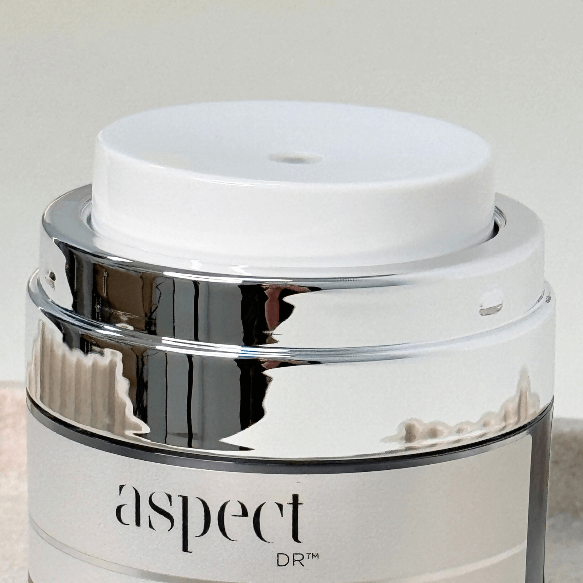 Aspect Dr Hydra A close up of pump top on white background