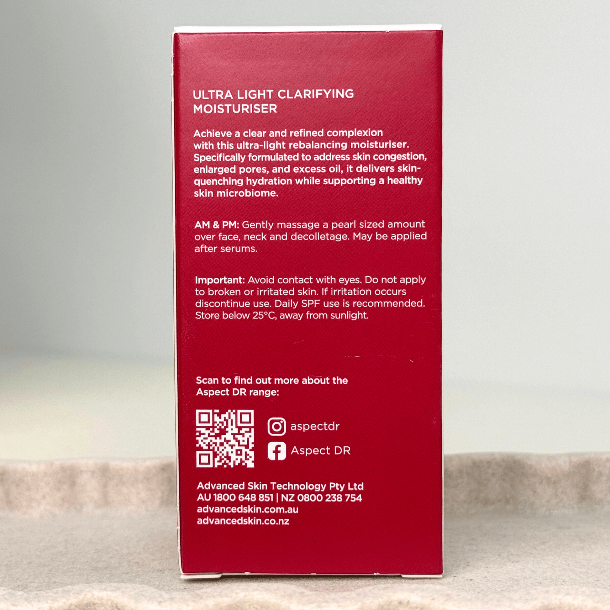 Aspect Dr Moisturiser for acne back of product box on neutral background