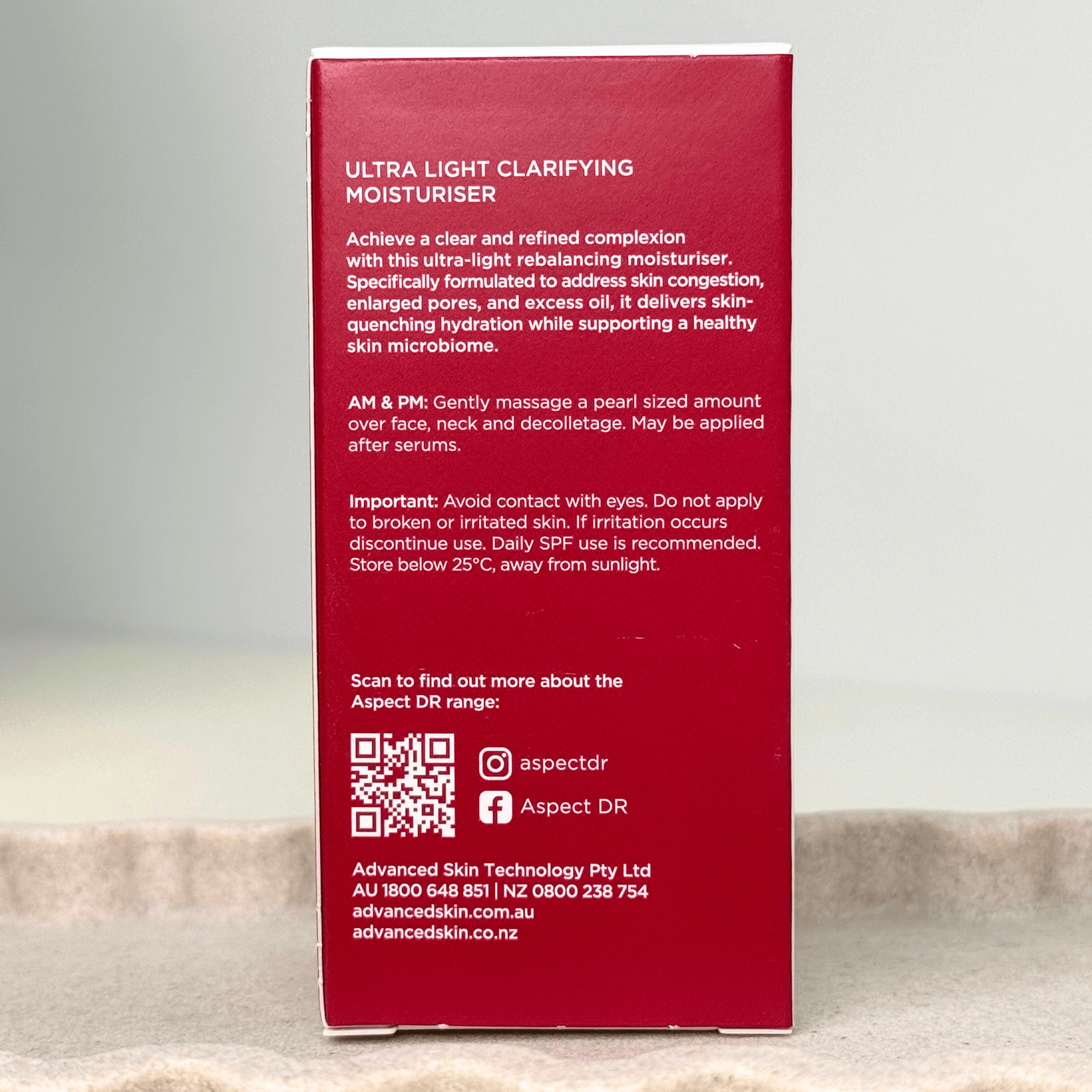 Aspect Dr Moisturiser for acne back of product box on neutral background