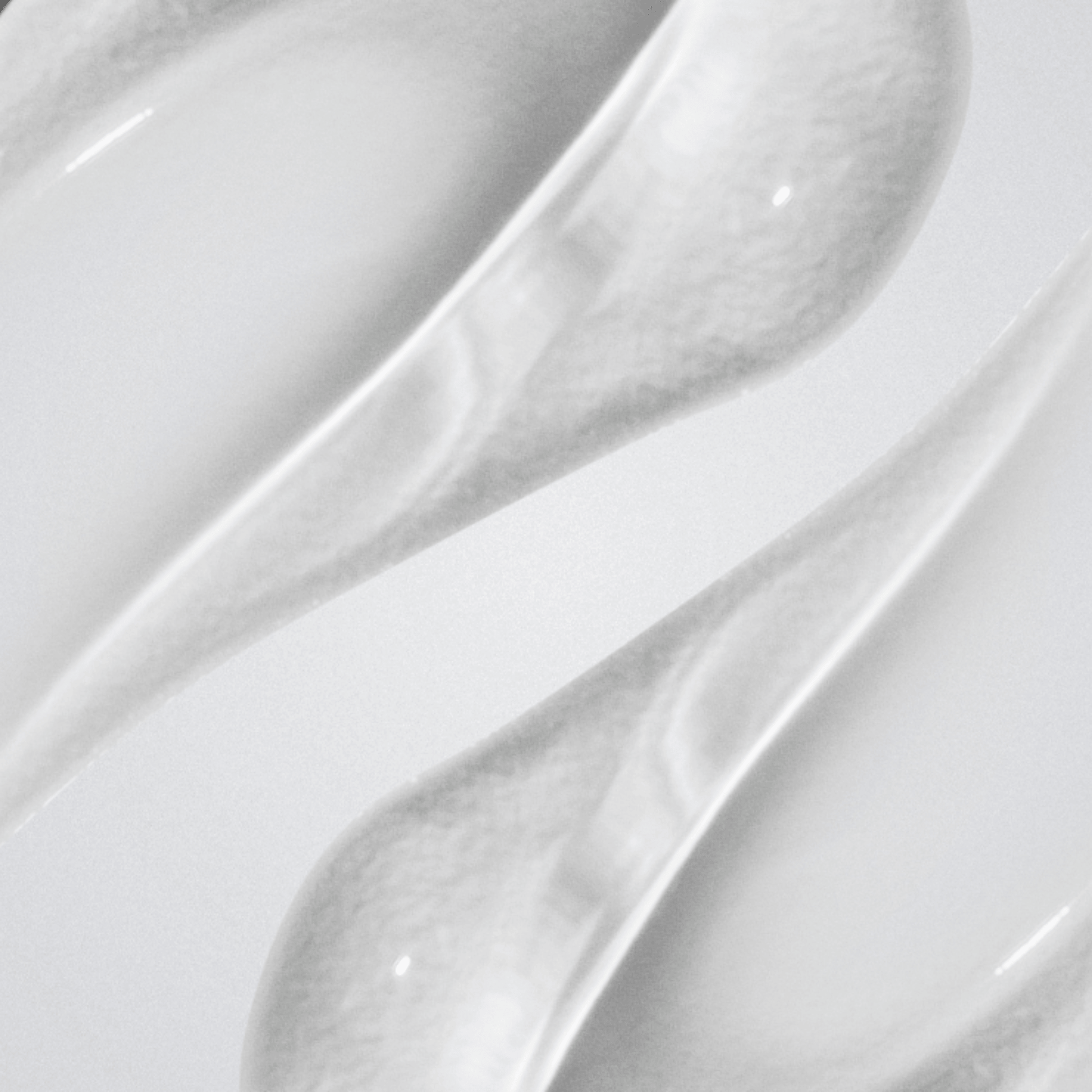 A close-up of glossy clear Aspect Dr Soothing Gel texture against a light grey background
