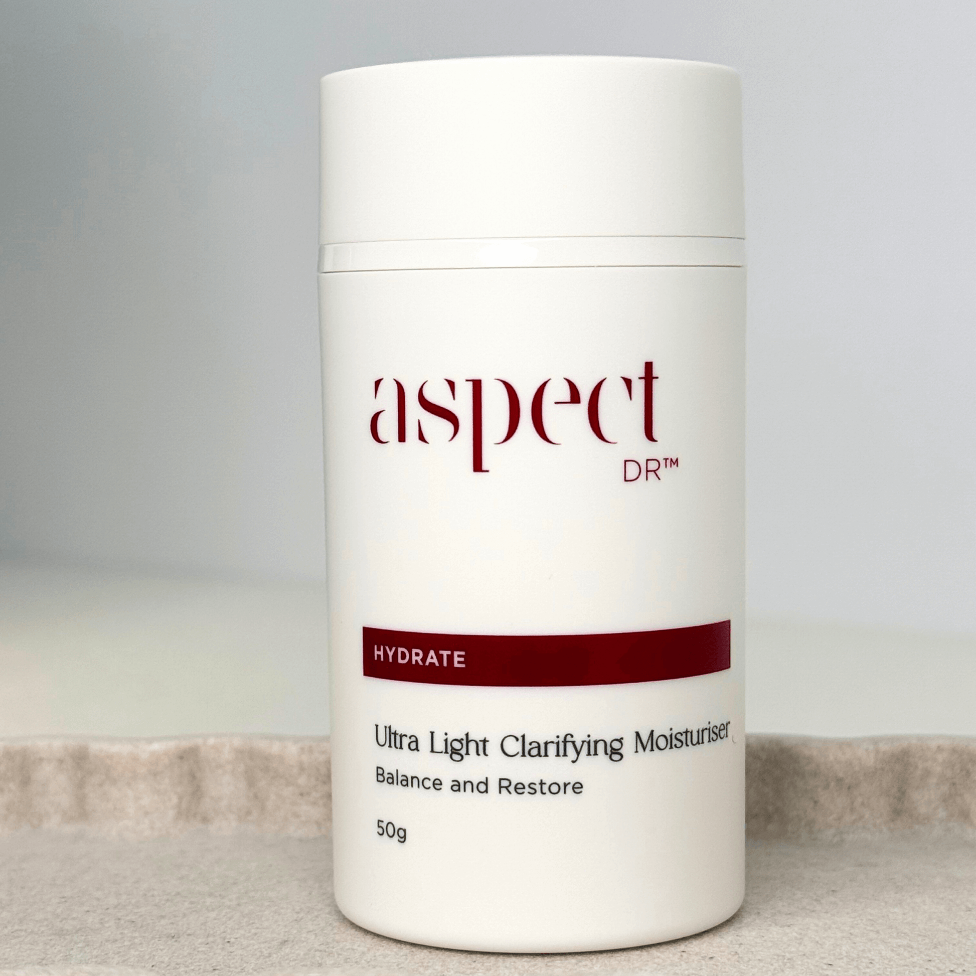 Aspect Dr Ultra Light Moisturiser container on neutral background