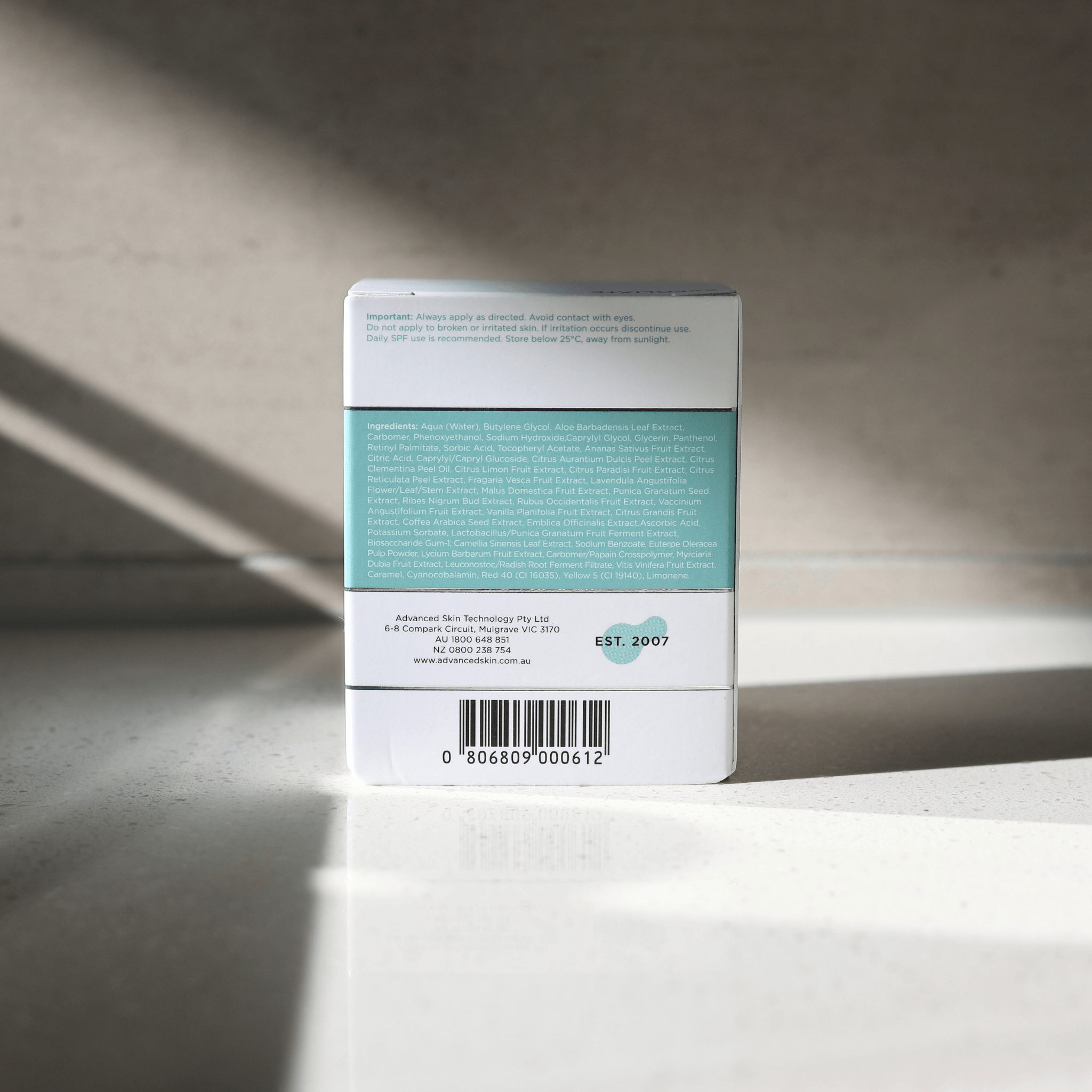 Aspect fruit enzyme mask Product packaging with text on a light surface