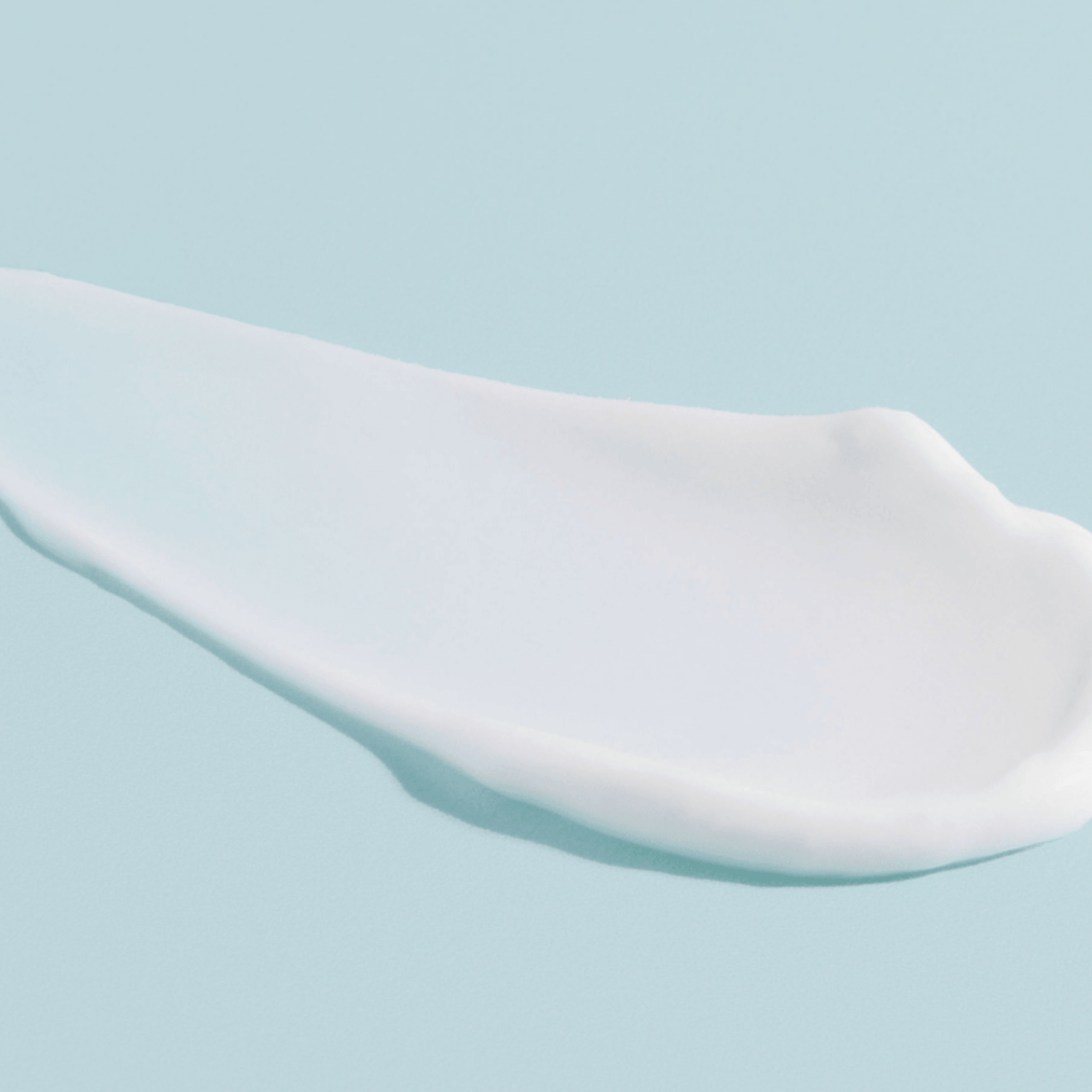 White Aspect Restorative 8 Night cream swatch on a light blue background
