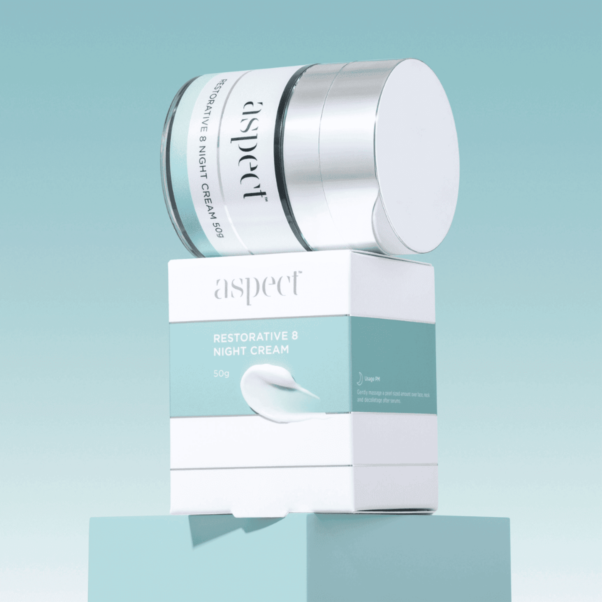 Aspect Restorative Night Cream with packaging on a light blue background