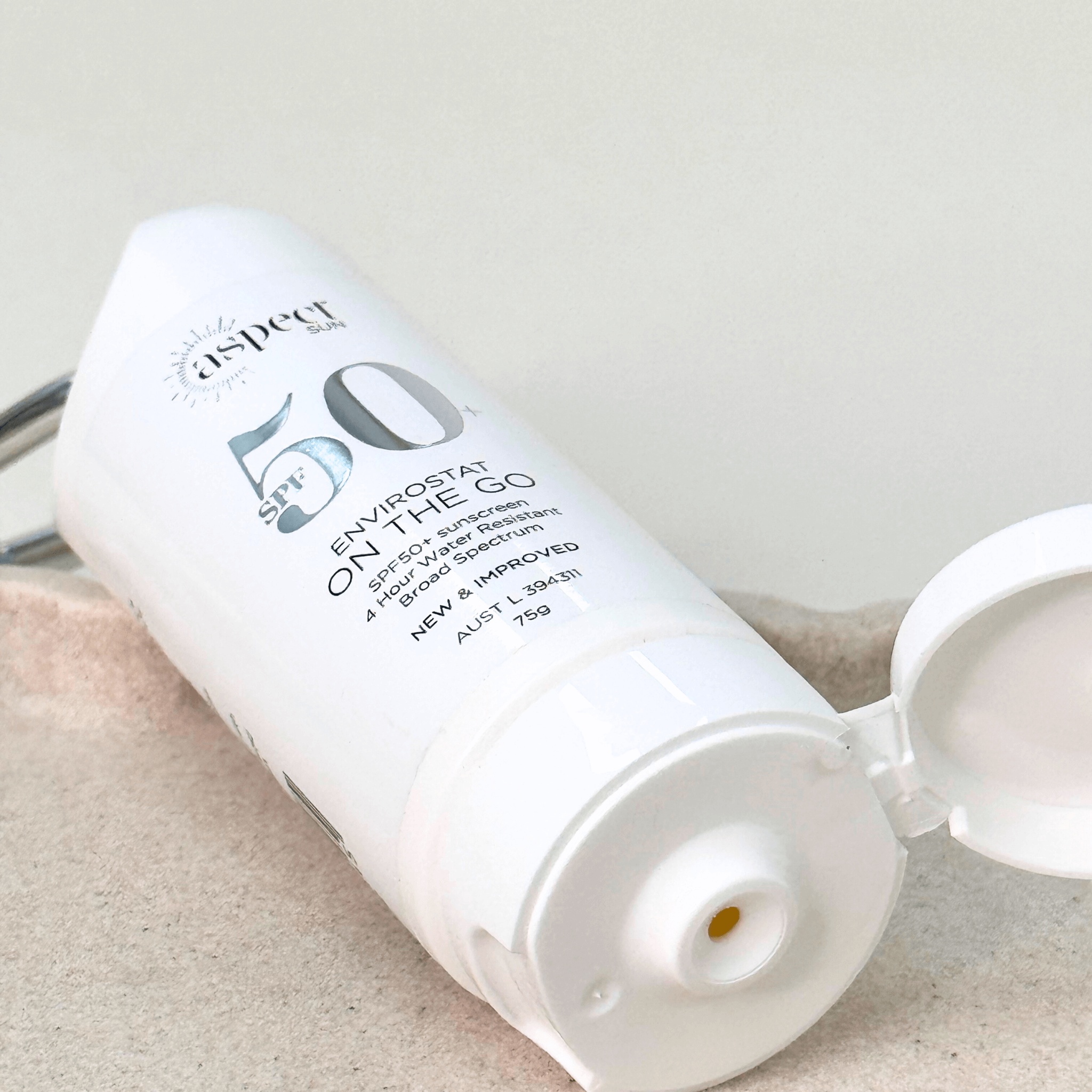 Aspect Sun SPF50 close up of sunscreen product and cap open