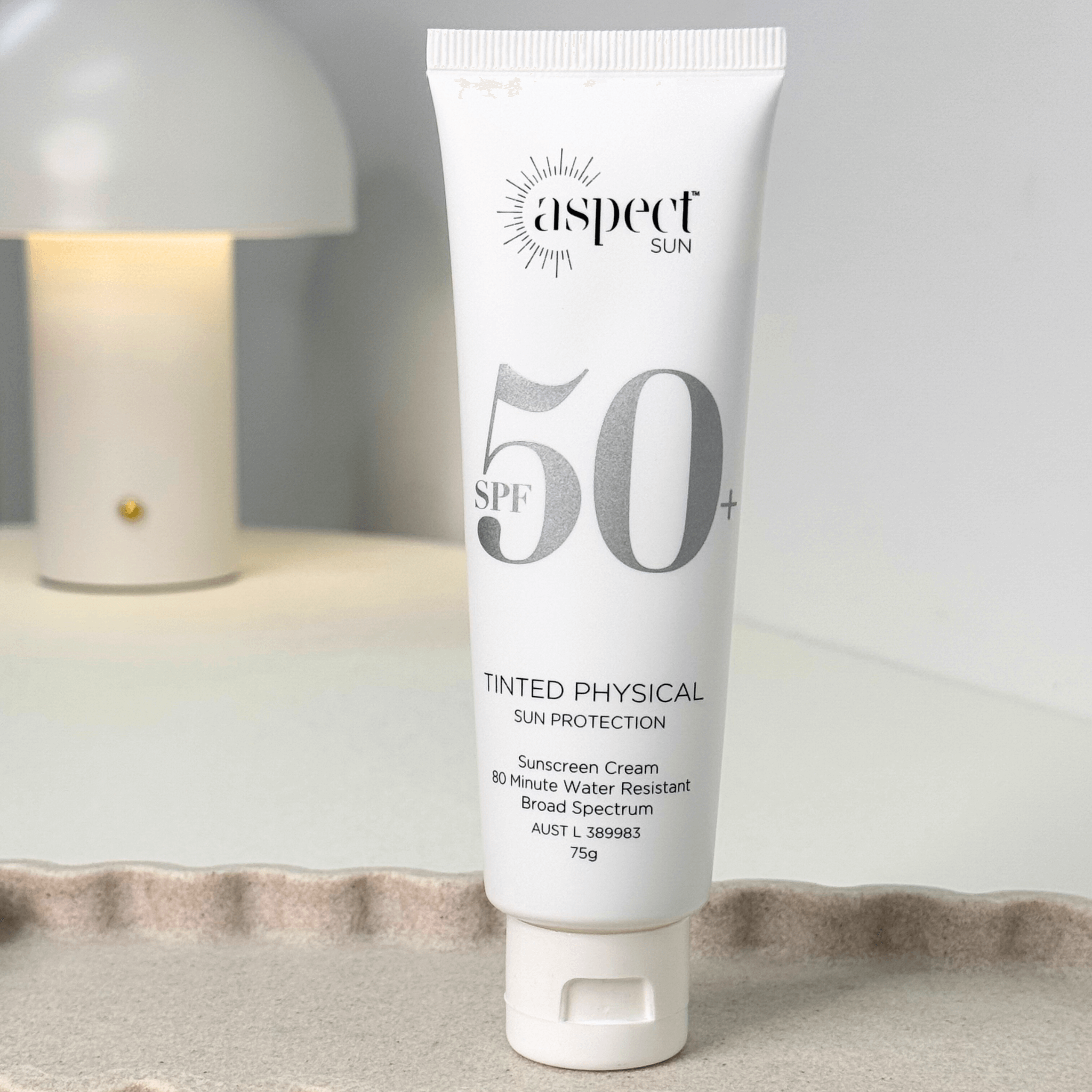 Aspect Sun Tinted SPF sun protection on neutral background