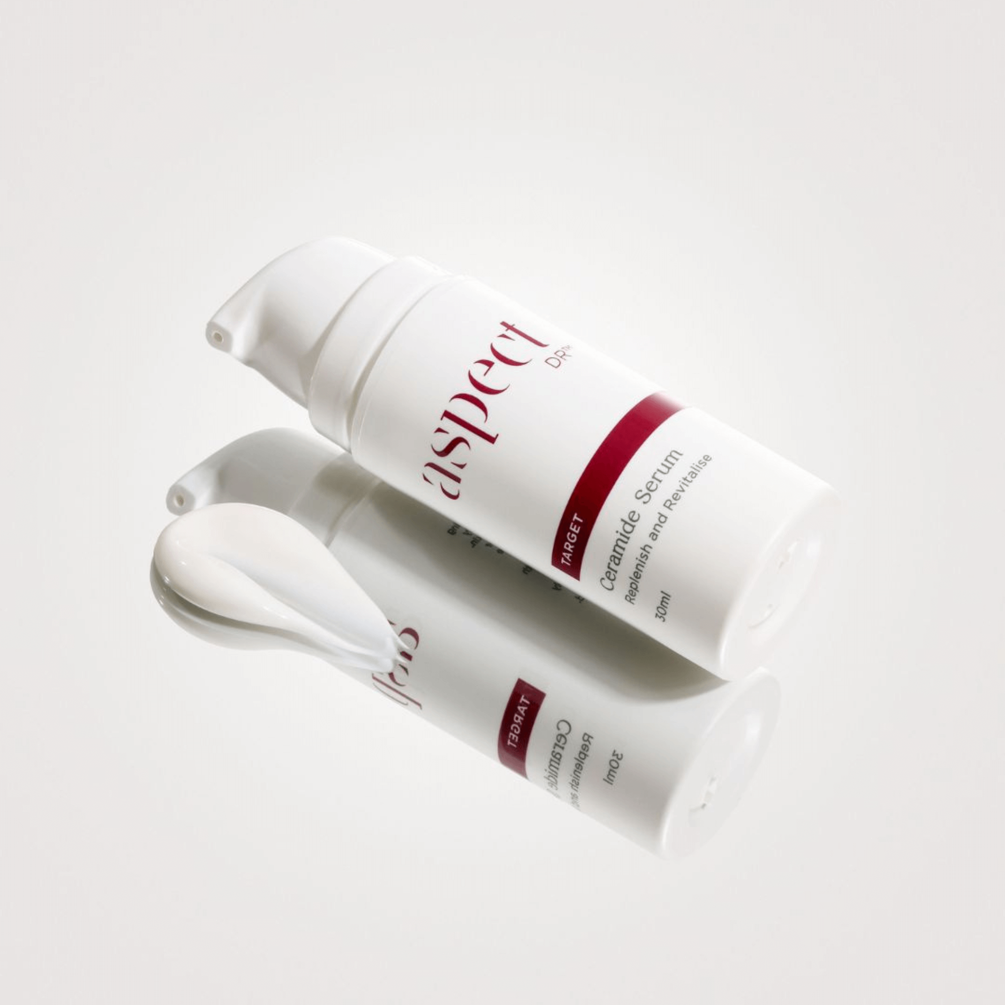 Aspect Dr Ceramide Serum Replenish and Revitalise laying down with reflection on white background