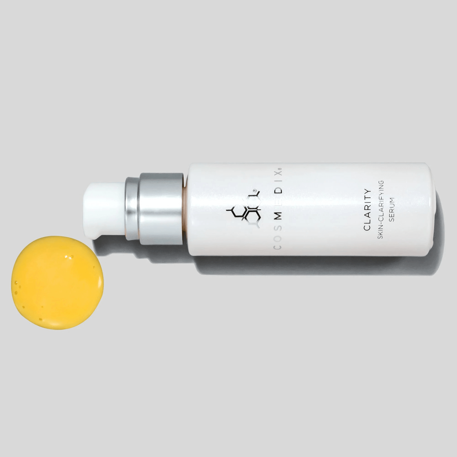 Cosmedix Clarity Serum bottle on light grey background