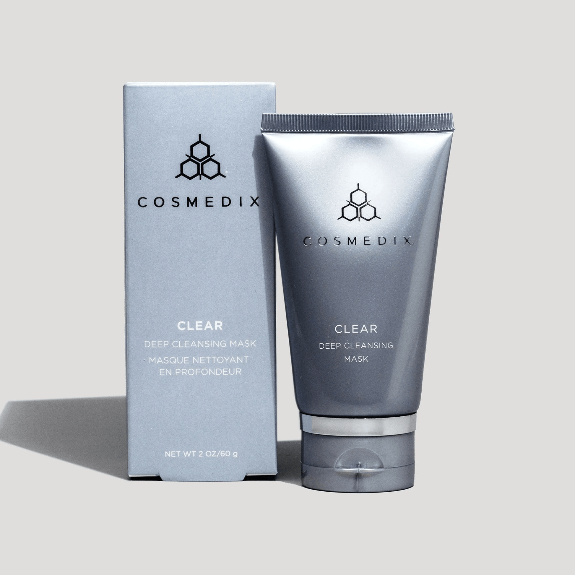 Cosmedix Deep Cleansing Mask packaging and tube on a light grey background