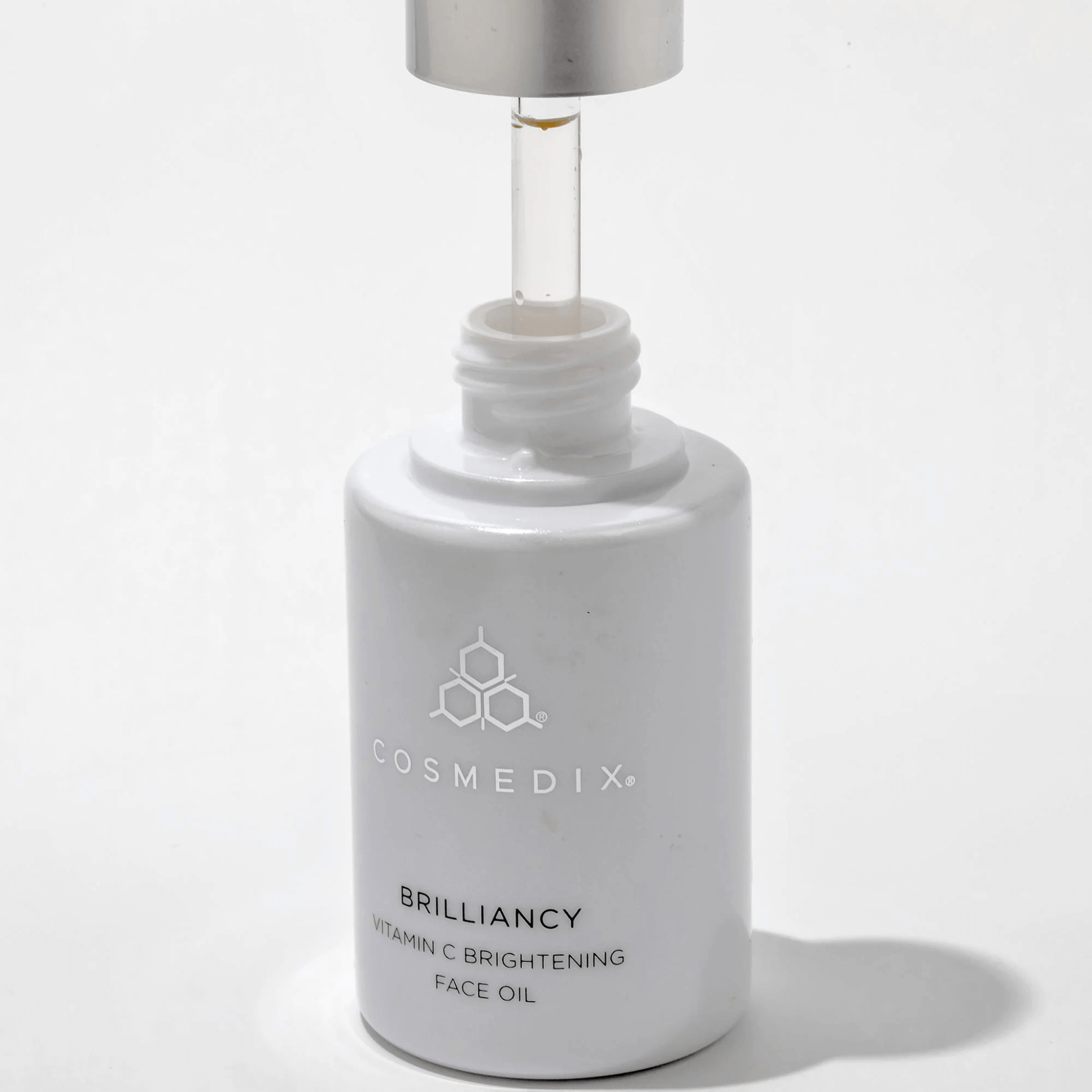 Cosmedix Brilliancy Vitamin C Brightening Face Oil bottle on a white background