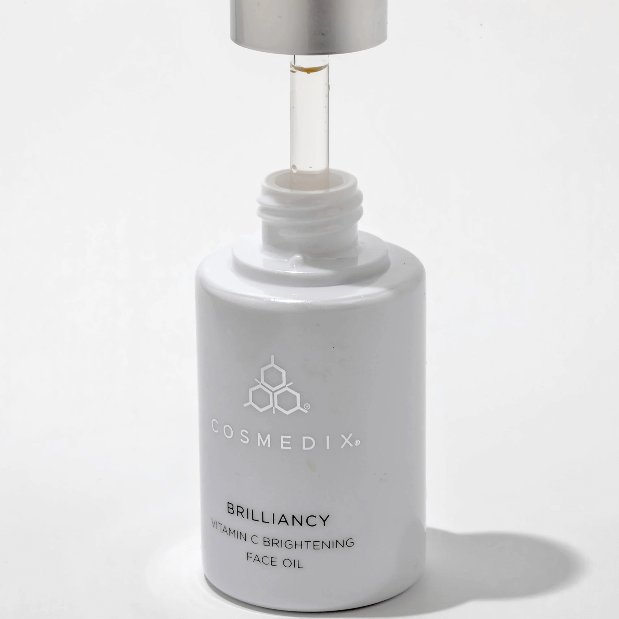 Cosmedix Brilliancy Vitamin C Brightening Face Oil bottle on a white background
