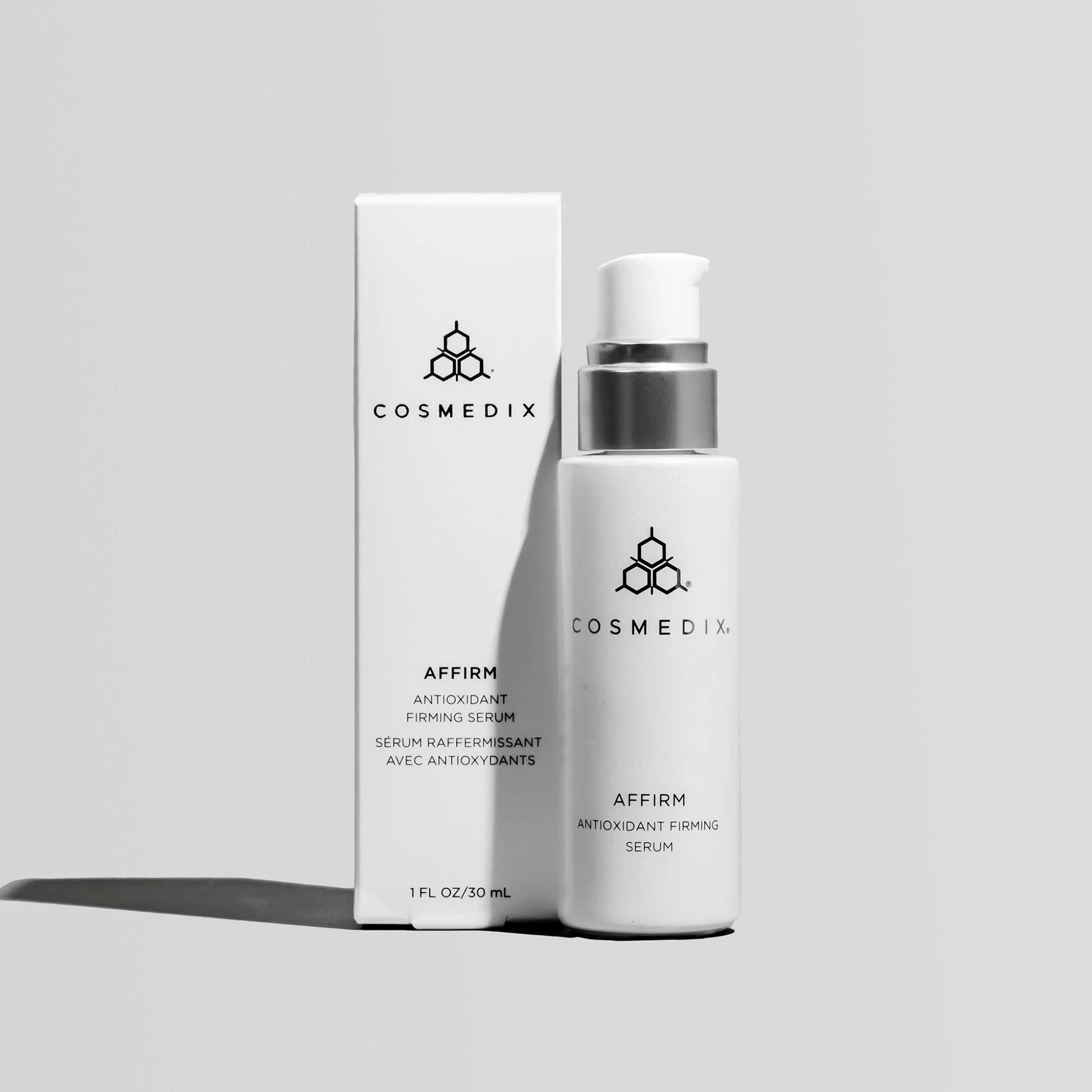 Cosmedix Affirm serum bottle and packaging on a light grey background