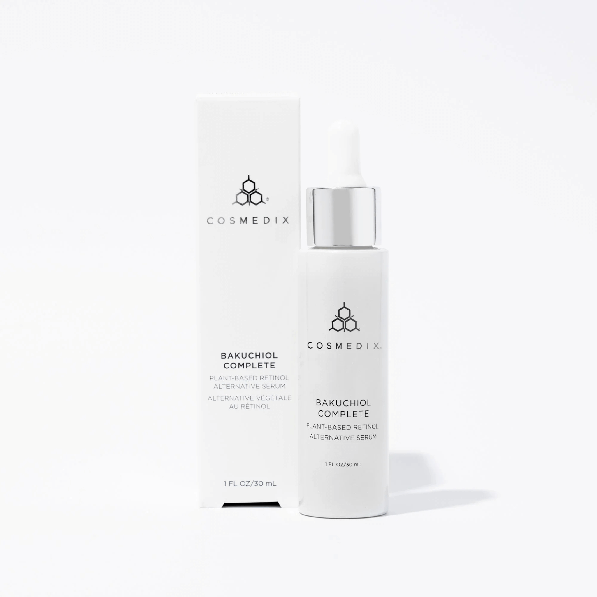 Cosmedix skincare serum bottle on a white background