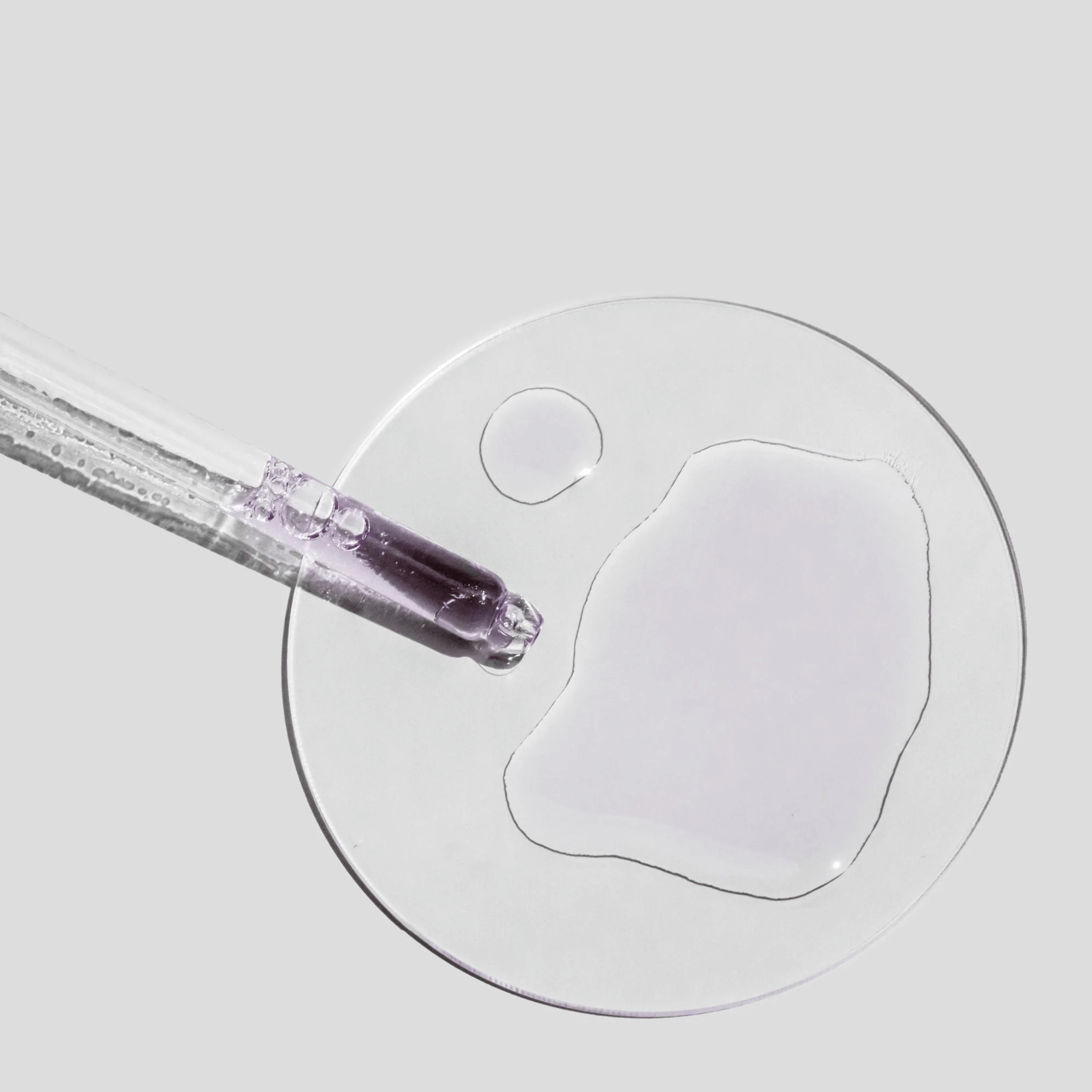 Cosmedix Bakuchiol Complete dropper with a purple tip on a light grey background