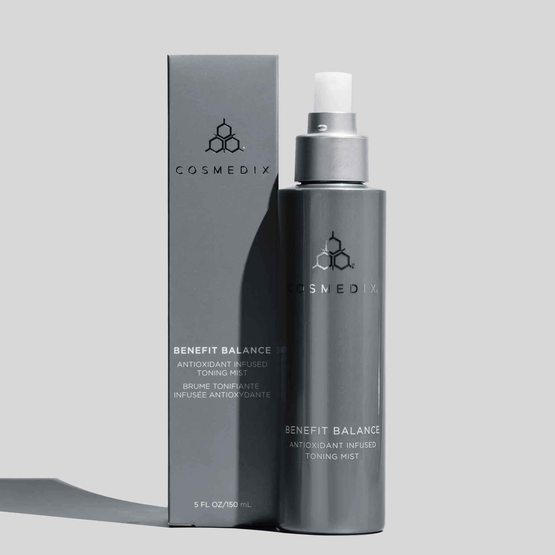 Cosmedix Benefit Balance Toning Mist bottle and packaging on a grey background