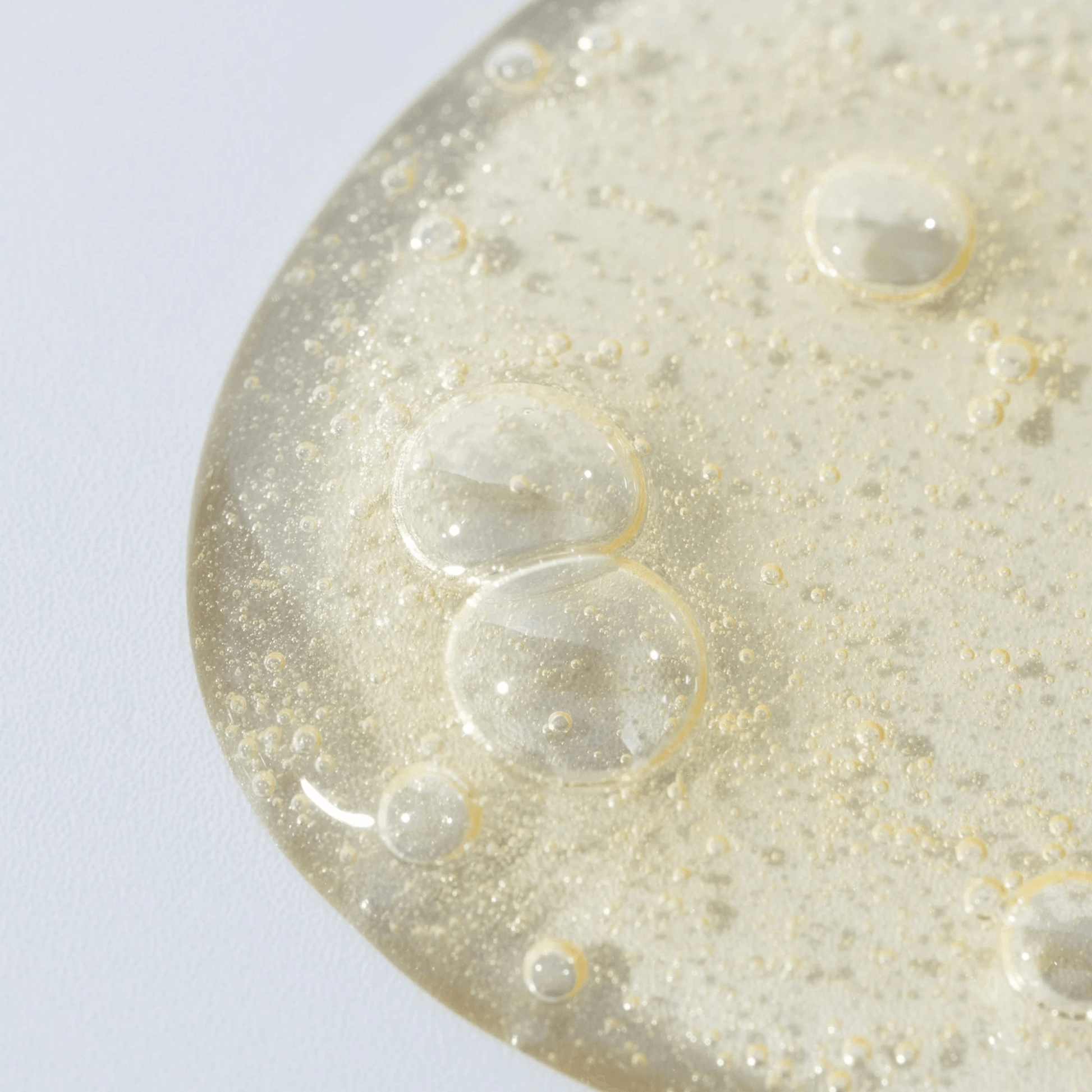 Close-up of Cosmedix Benefit clean cleanser on a light background