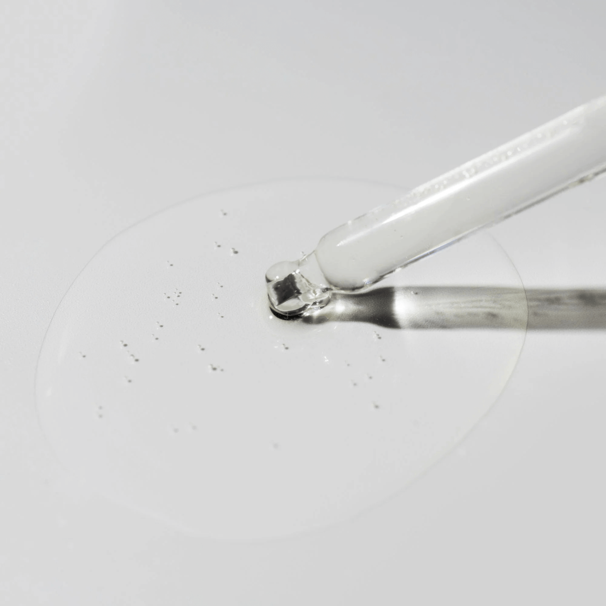 Close up of Cosmedix BrillianCy skincare serum swatch from dropper