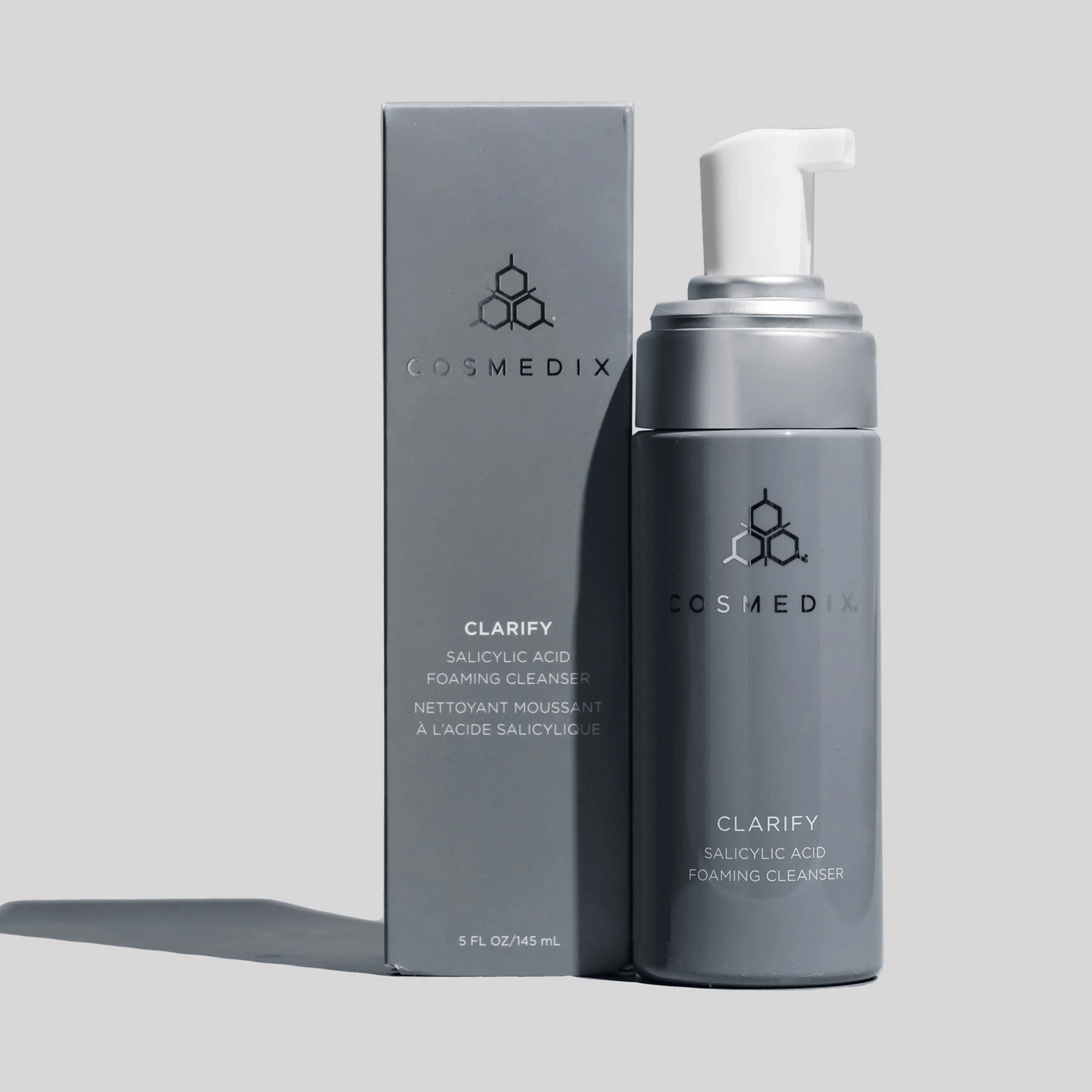Cosmedix Clarify foaming cleanser with packaging on a light grey background