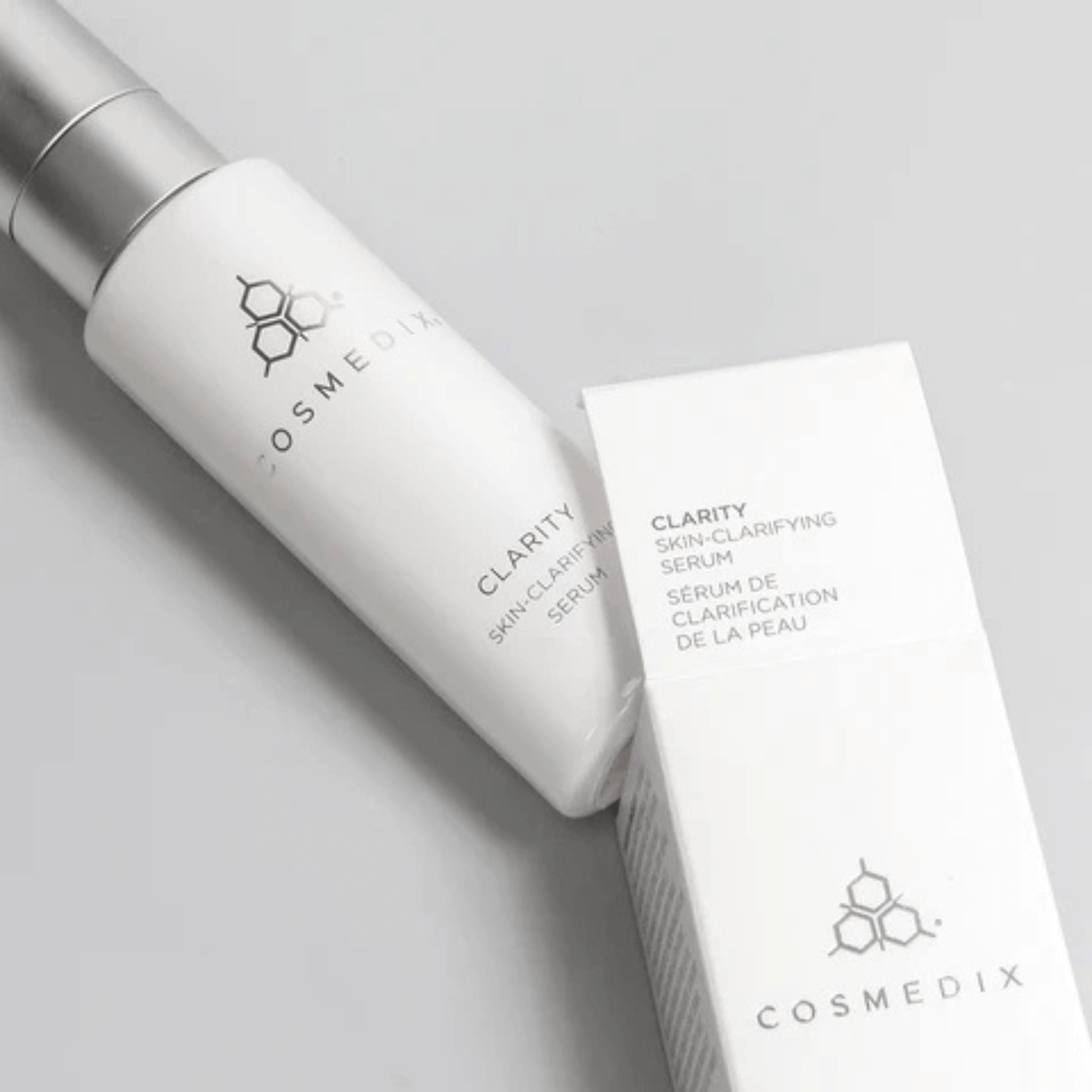 Cosmedix Clarity Skin-Clarifying Serum bottle and packaging on a light grey background
