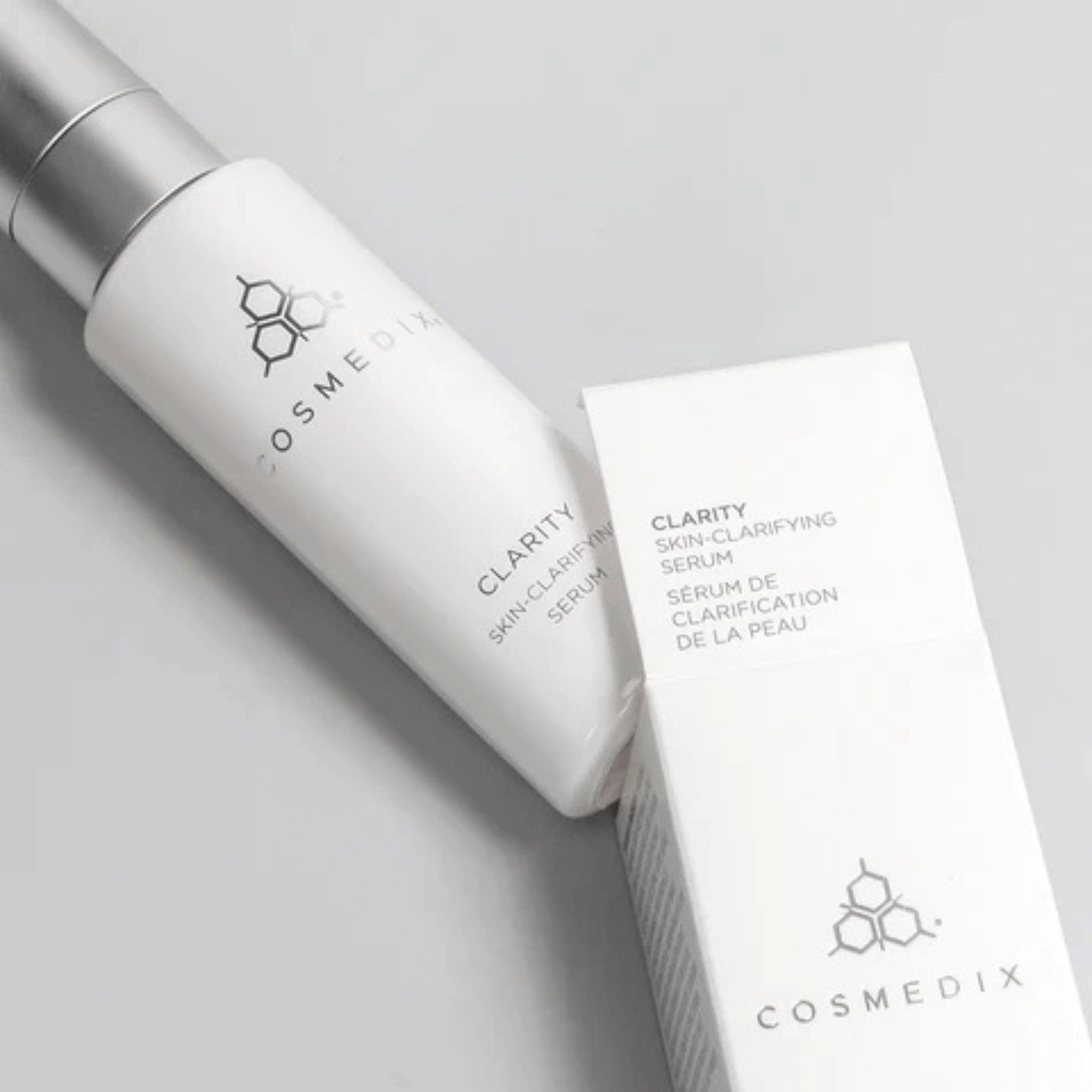 Cosmedix Clarity Skin-Clarifying Serum bottle and packaging on a light grey background