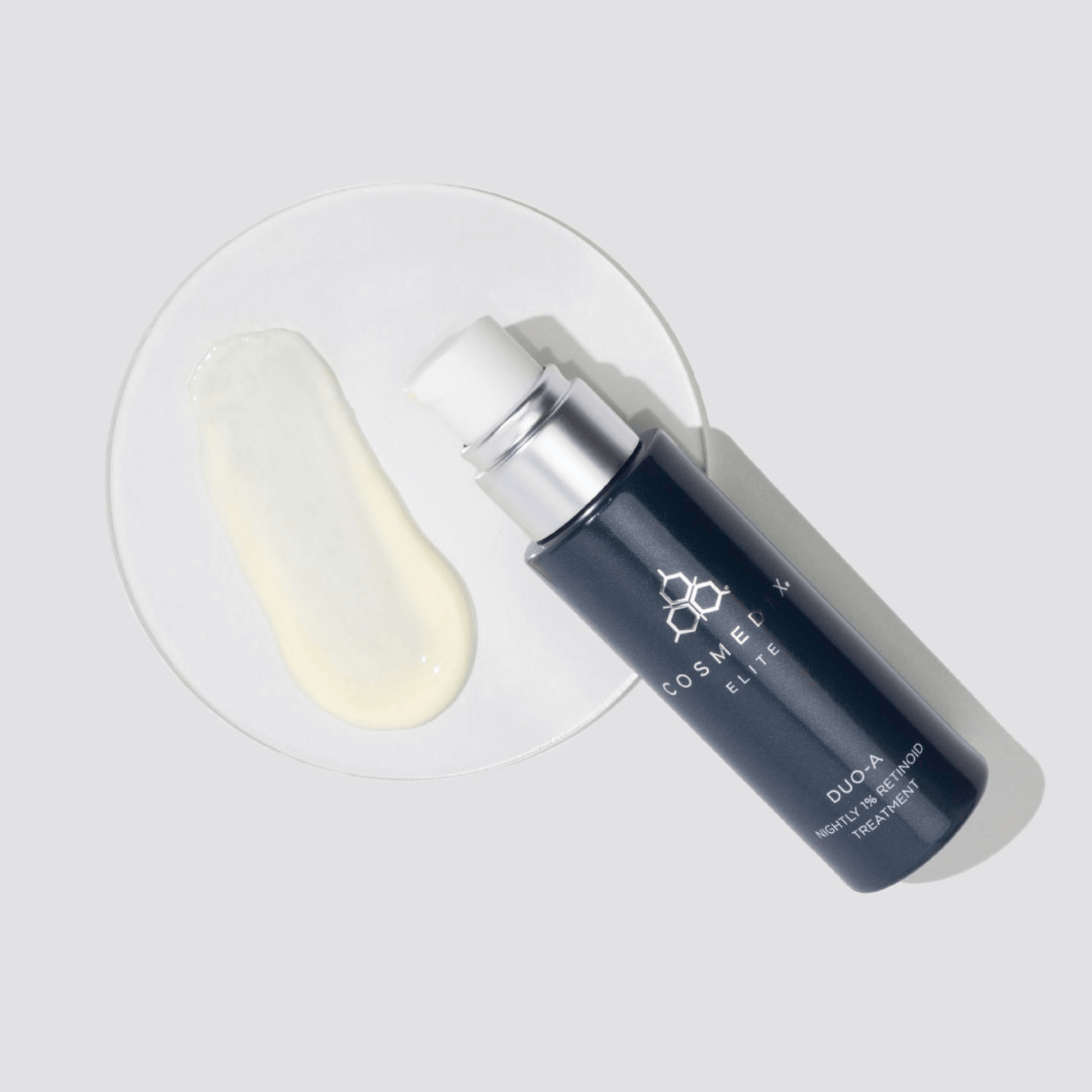 COSMEDIX ELITE DUO-A bottle with a white cap on a light grey background
