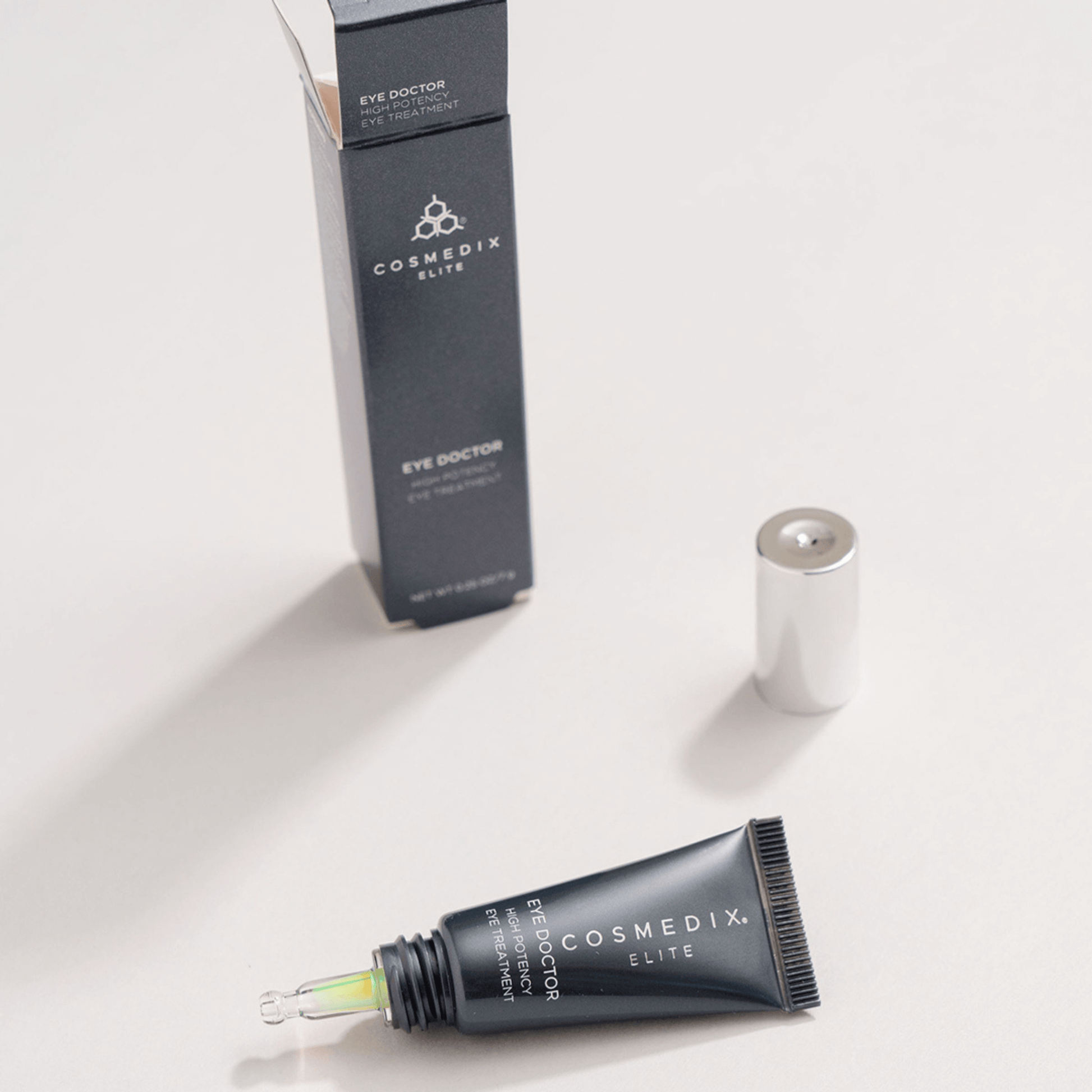 Cosmedix Elite eye Dr cream with packaging on a light background