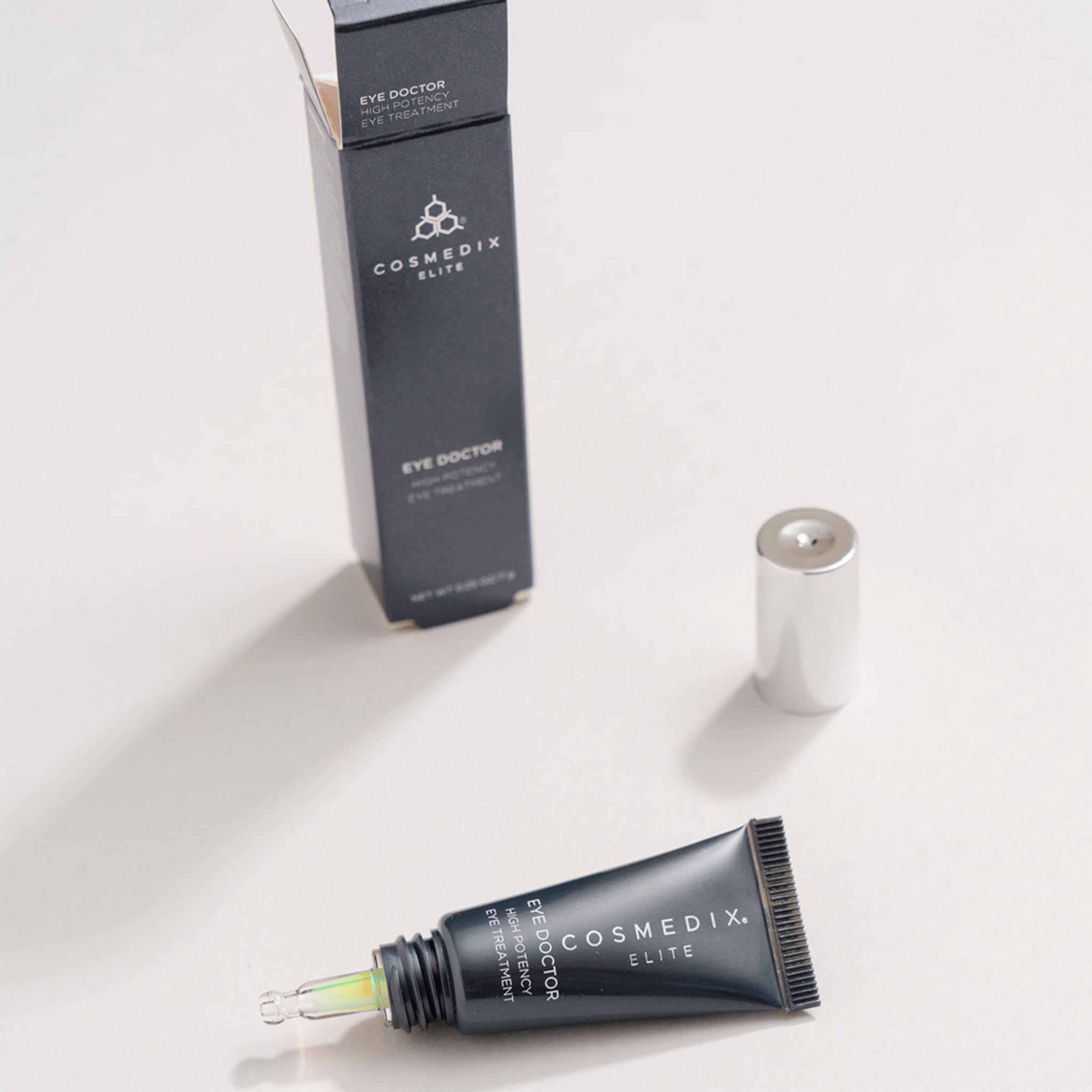 Cosmedix Elite eye Dr cream with packaging on a light background