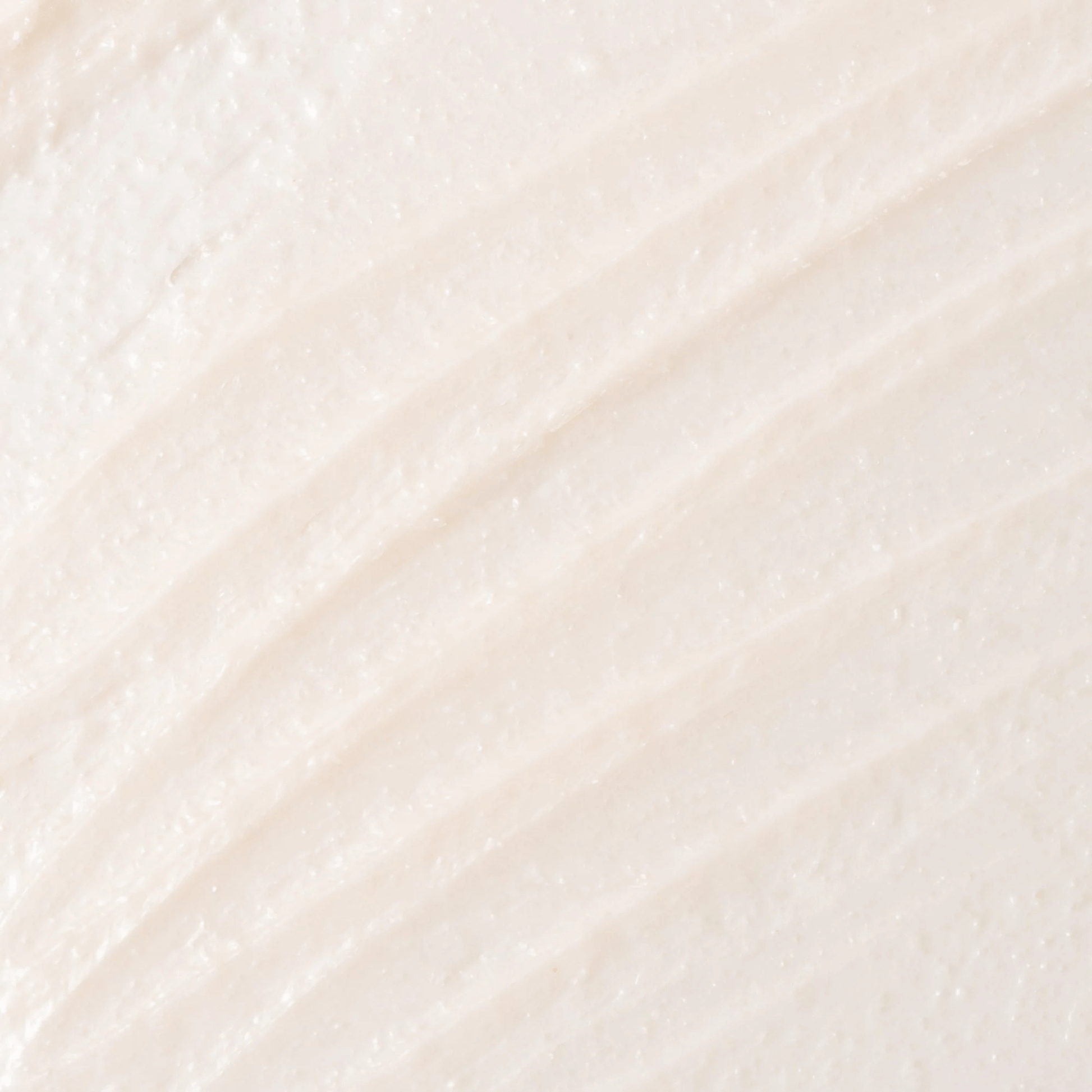 Close-up textured skincare swatch of Cosmedix Glow Mask