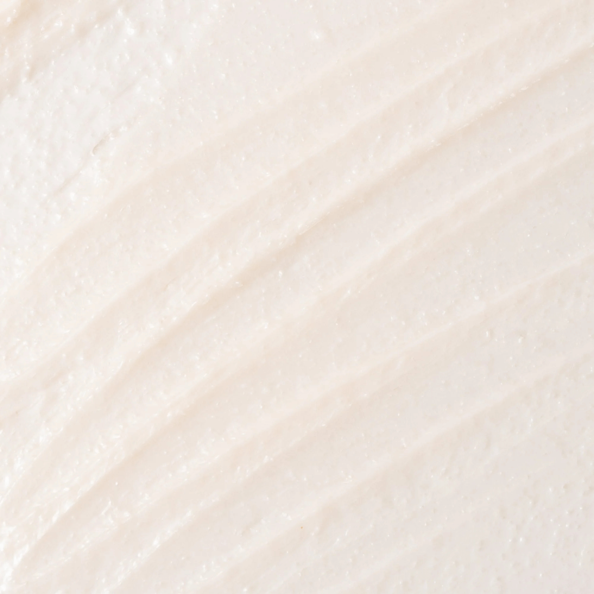 Close-up textured skincare swatch of Cosmedix Glow Mask