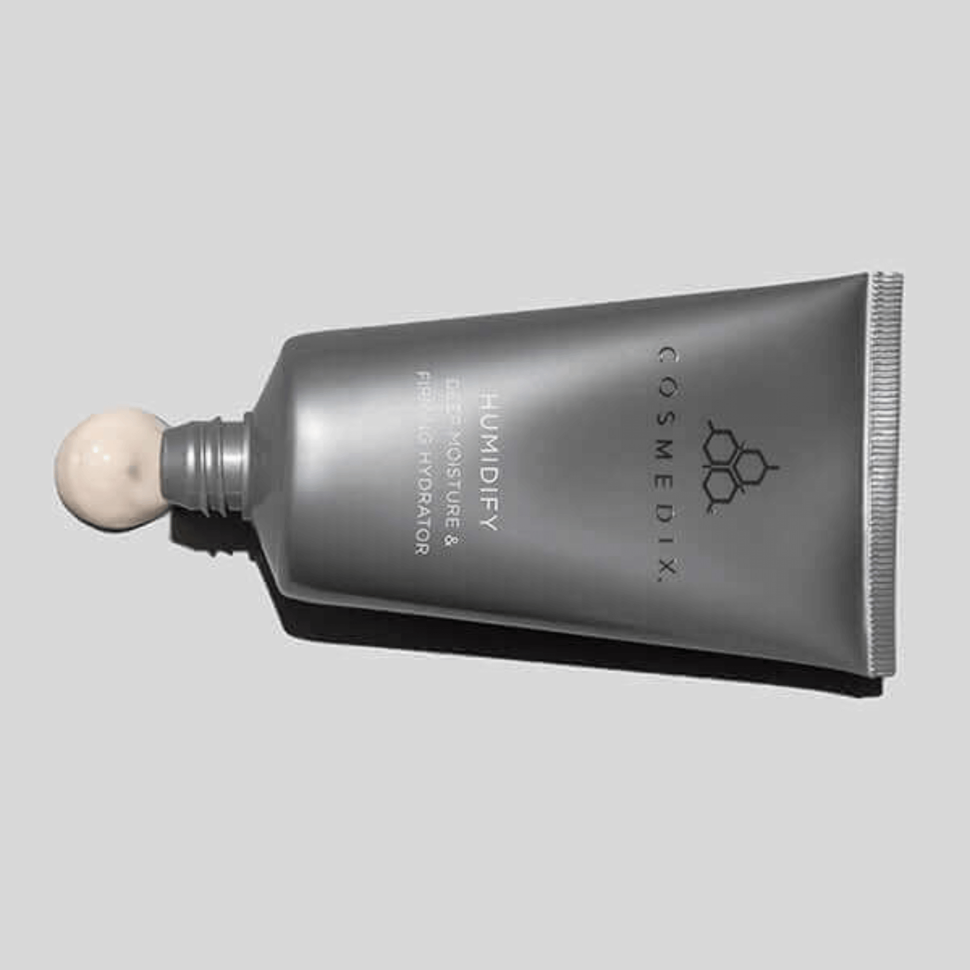 Cosmedix humidify moisturiser on a grey background