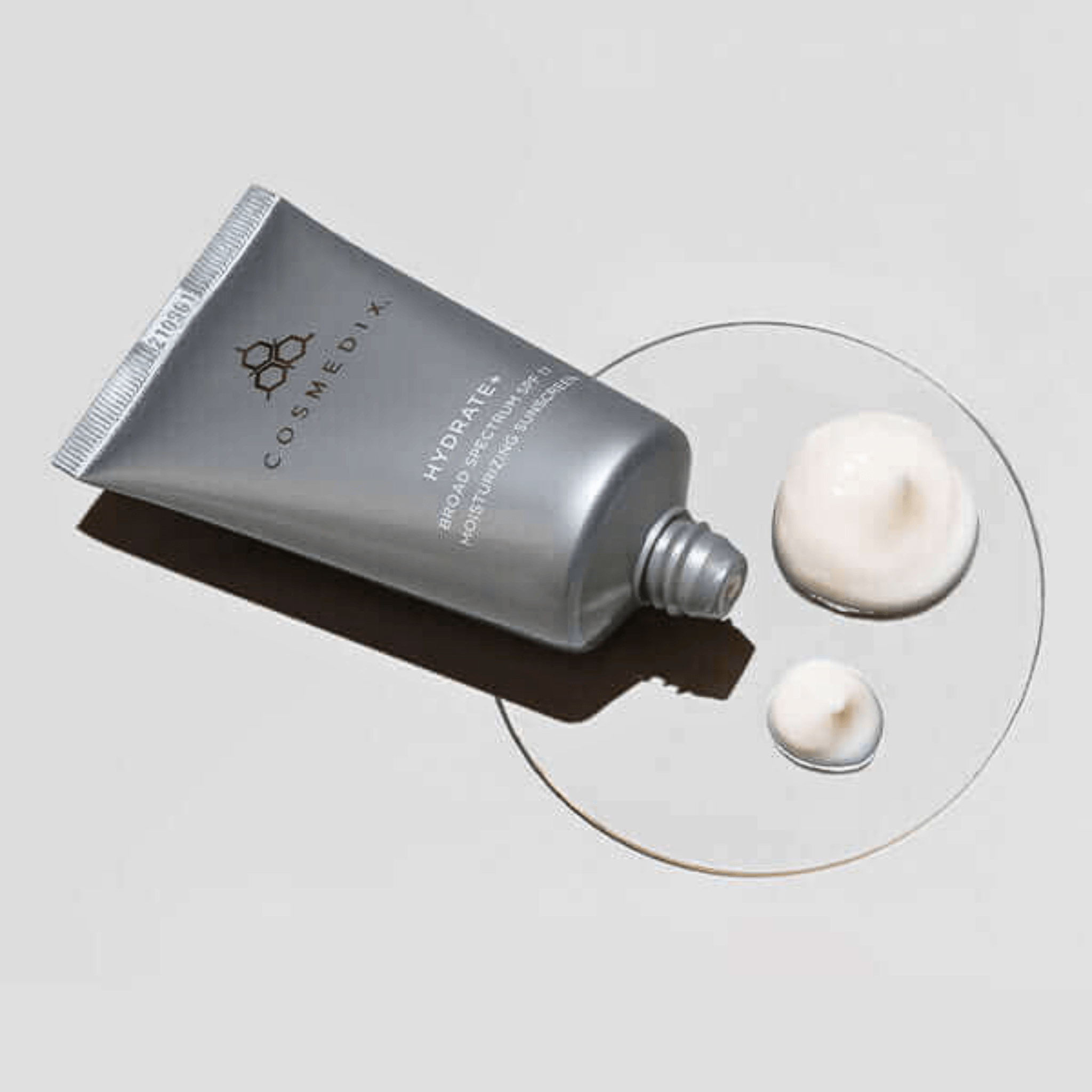 Cosmedix Hydrate+ with cream on a white background