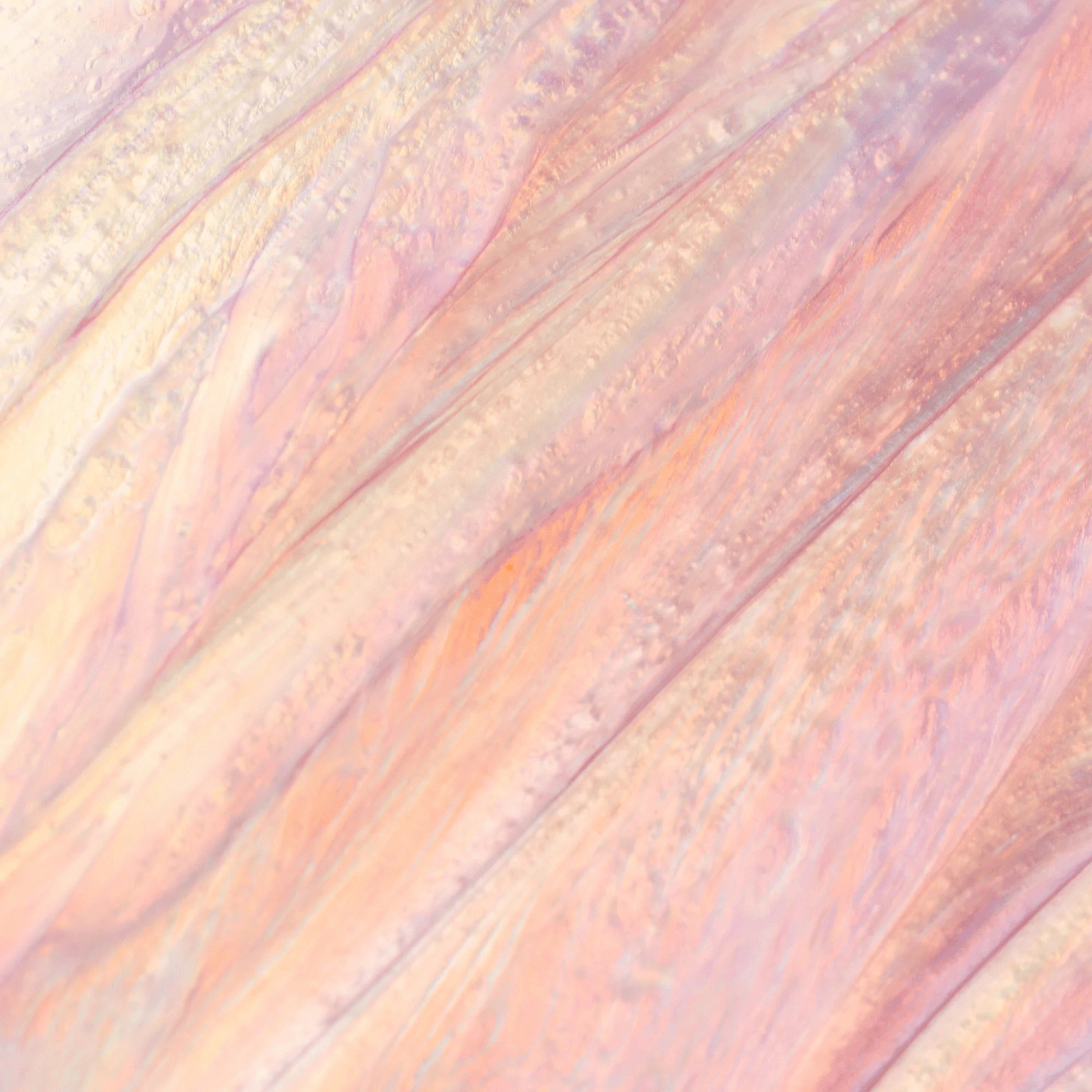 Cosmedix lumi crystal shimmer lip gloss with pastel-coloured soft shades of pink, purple, and orange.