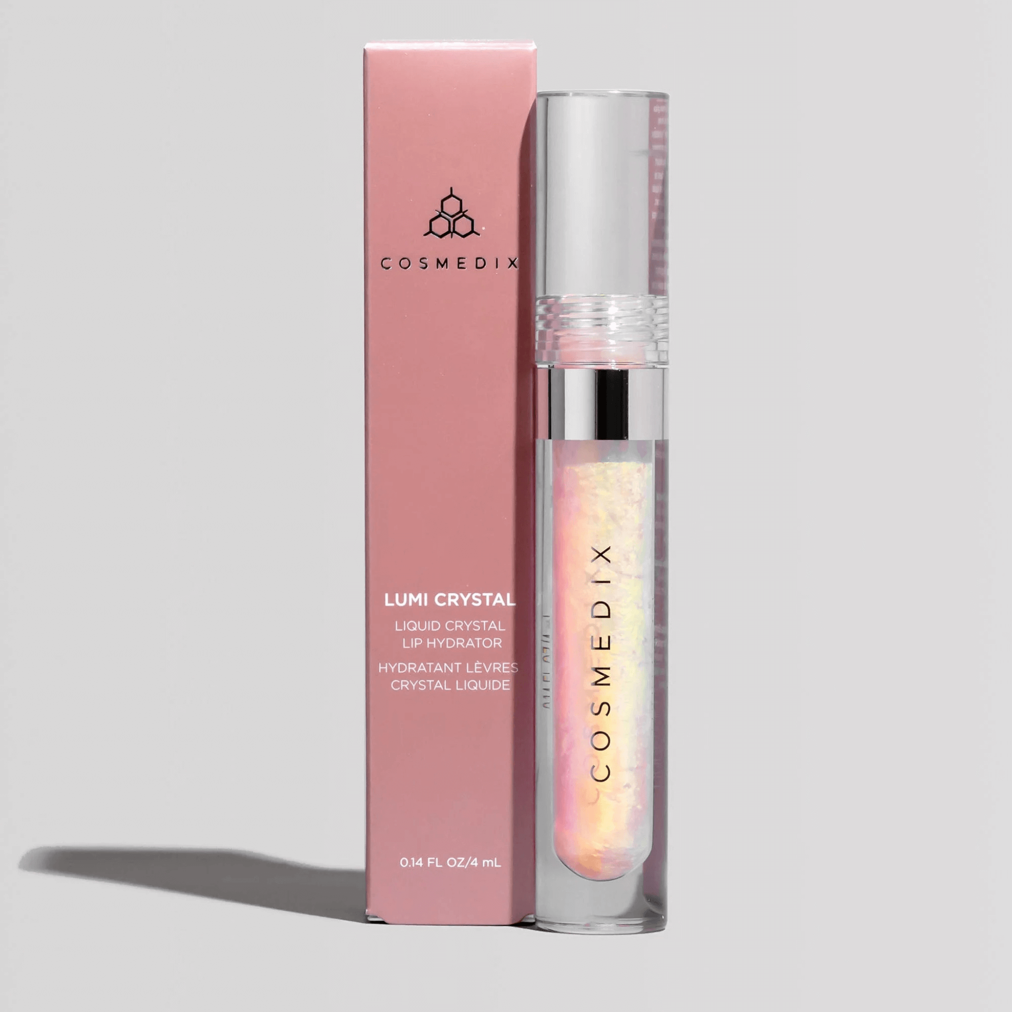 Cosmedix Lumi Crystal lip treatment with pink packaging on a light grey background