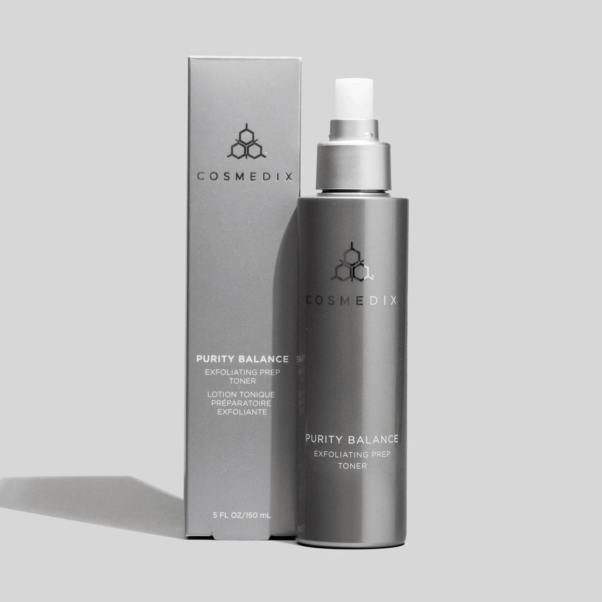 Cosmedix Purity Balance Exfoliating Prep Toner bottle and packaging on a light grey background