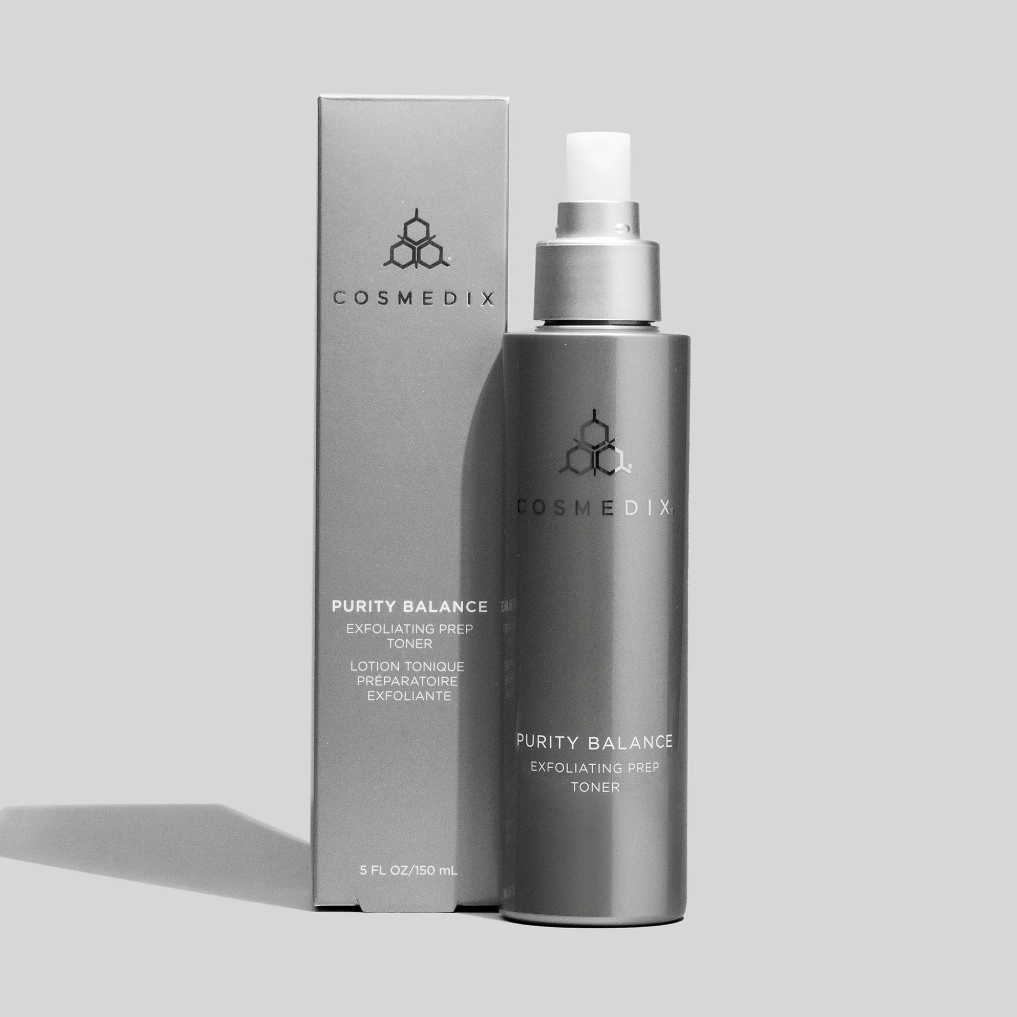 Cosmedix Purity Balance Exfoliating Prep Toner bottle and packaging on a light grey background