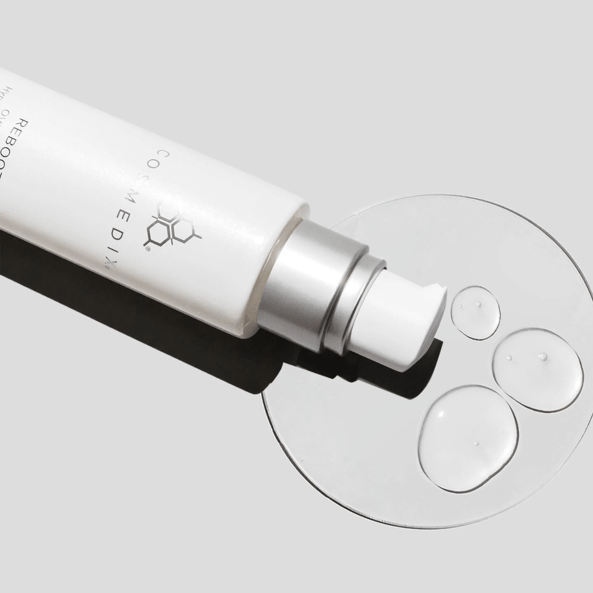 Cosmedix Reboot Skincare bottle with dropper on a light grey background