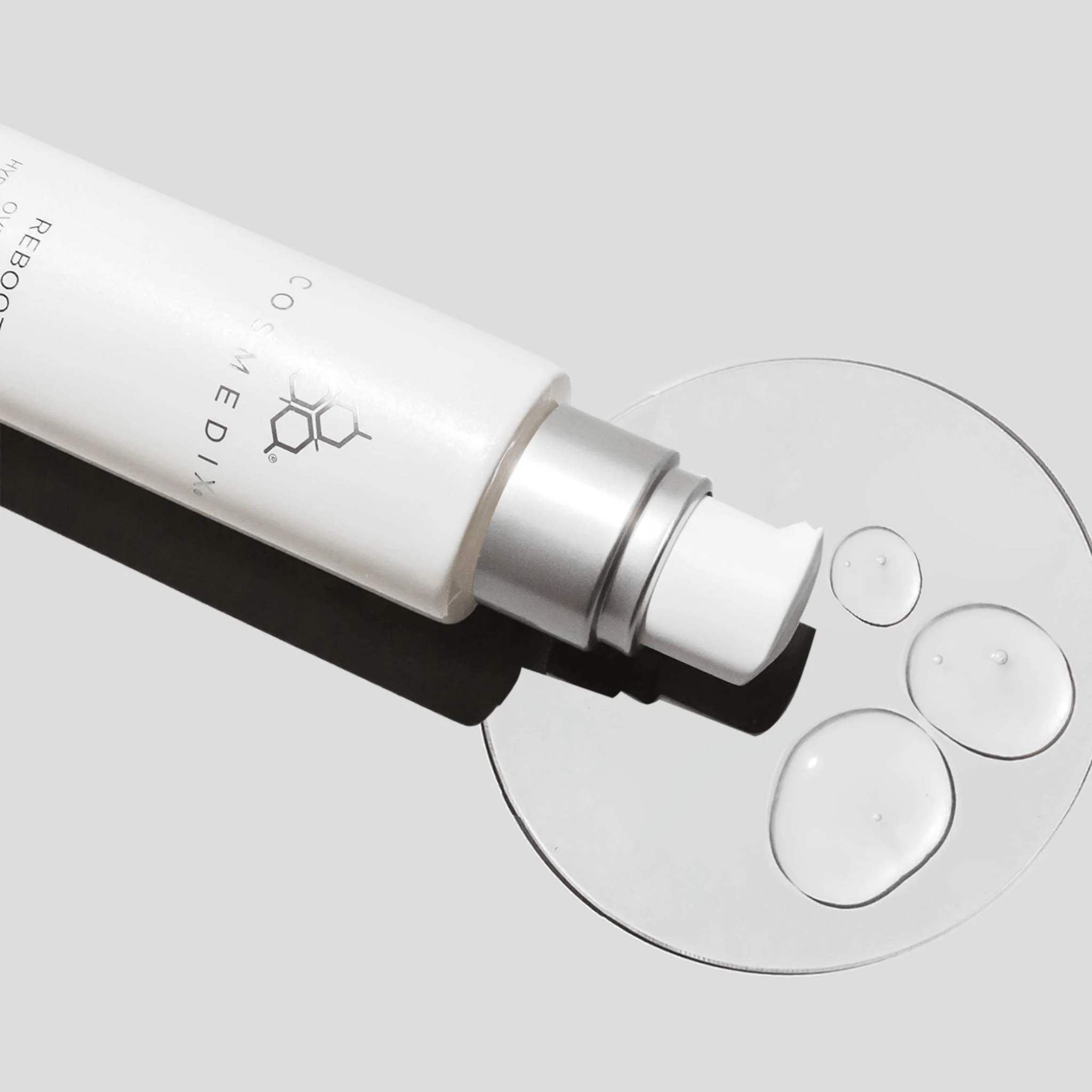 Cosmedix Reboot Skincare bottle with dropper on a light grey background