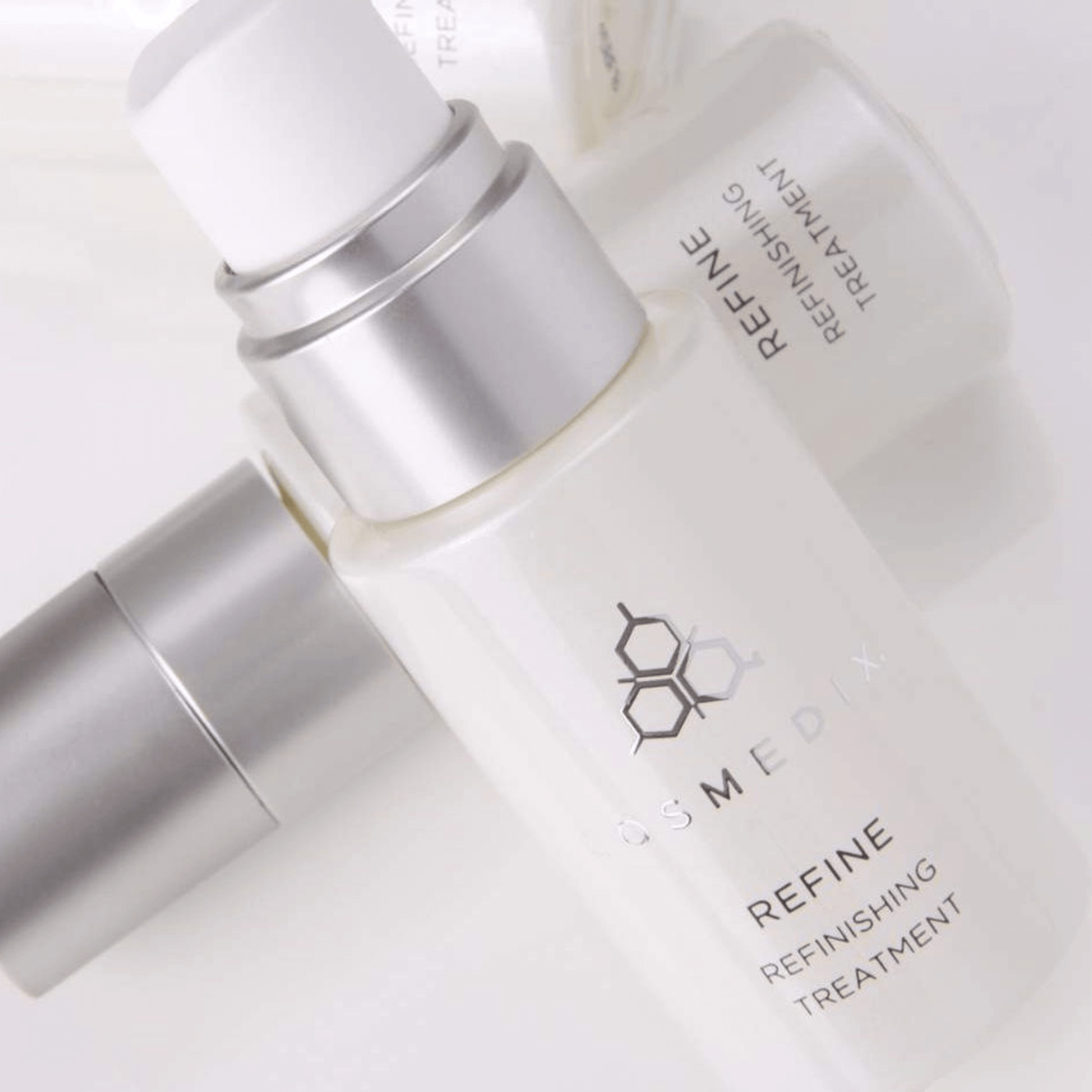 Cosmedix Refine Refinishing Treatment bottles on white backgorund